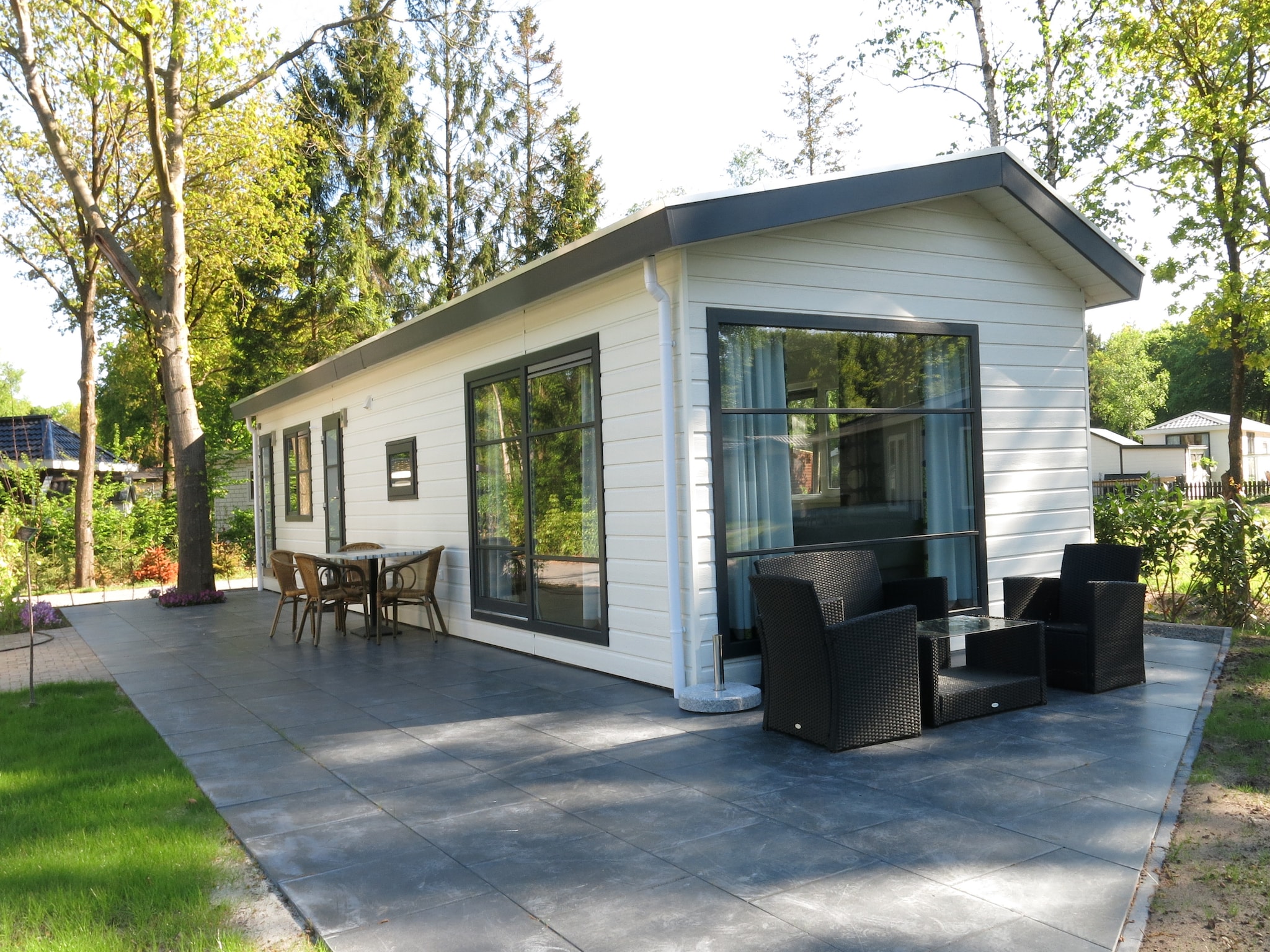 Modern chalet with two terraces and near a pond