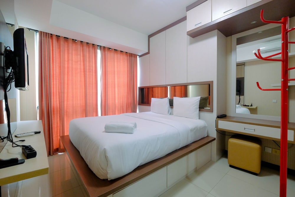 Modern 2BR Apartment at Kemang Village By Travelio