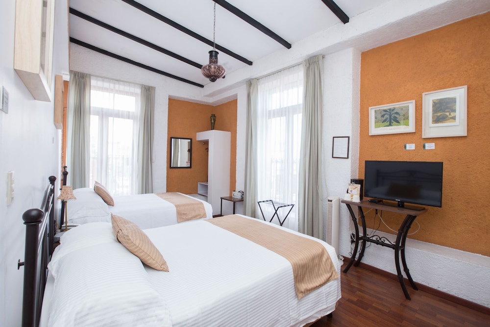 Portico Hotel Cultural