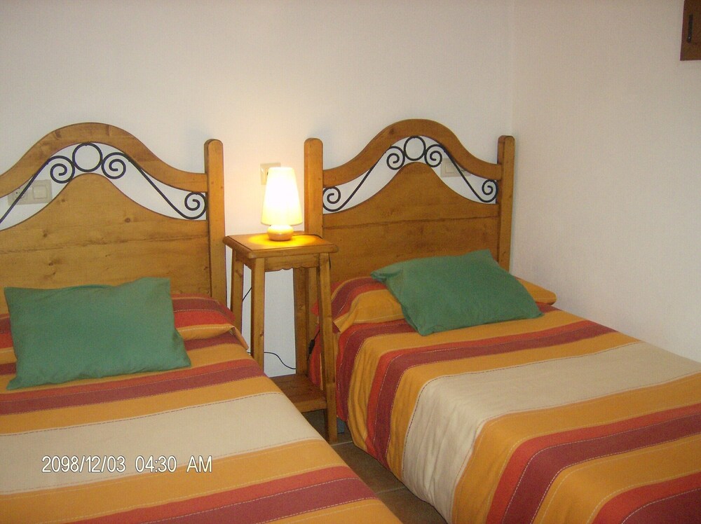 Ground floor Apartment, with shared Pool  and Sea Views one minute to the Beach