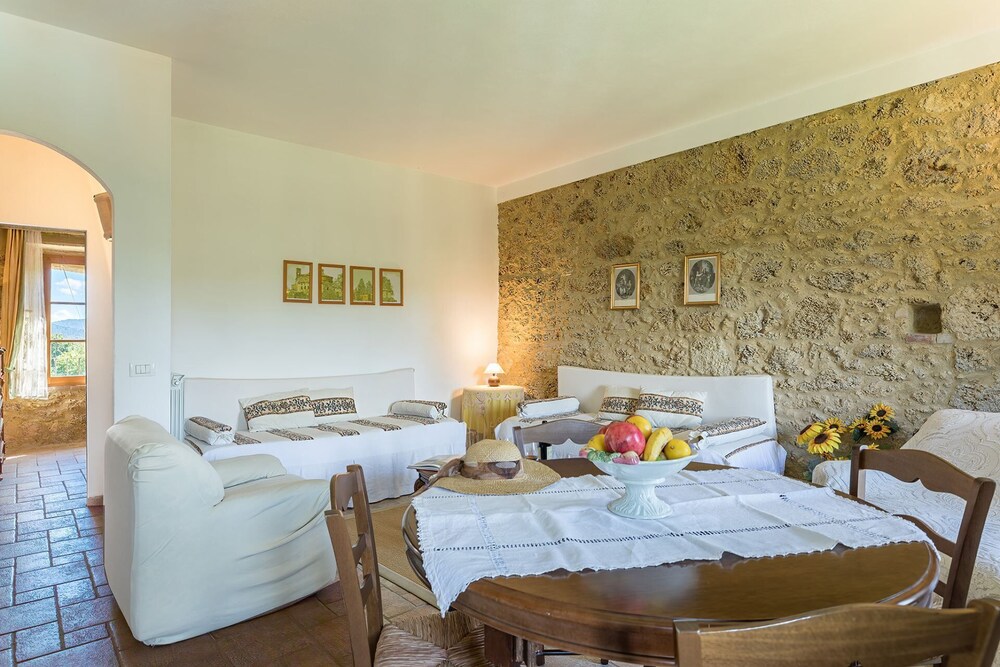 A beautiful 17th century stone farmhouse with spacious garden and private pool , family friendly