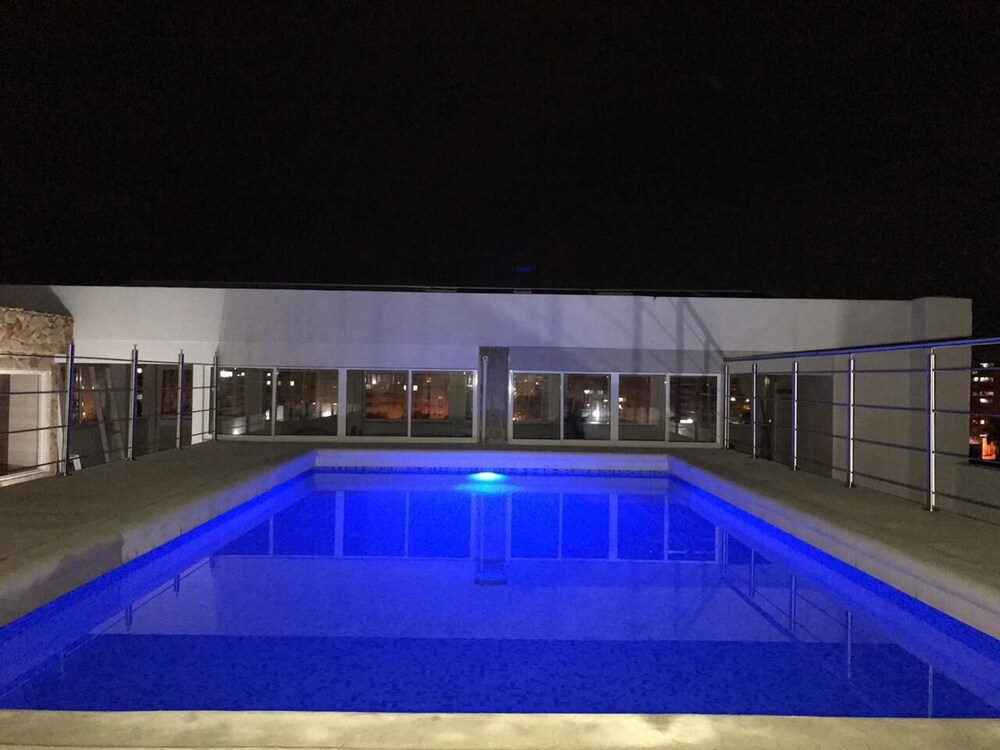 Apartasuites La Flora
