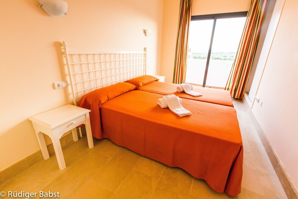 Near Vera Beach and water park. With pools and bar.