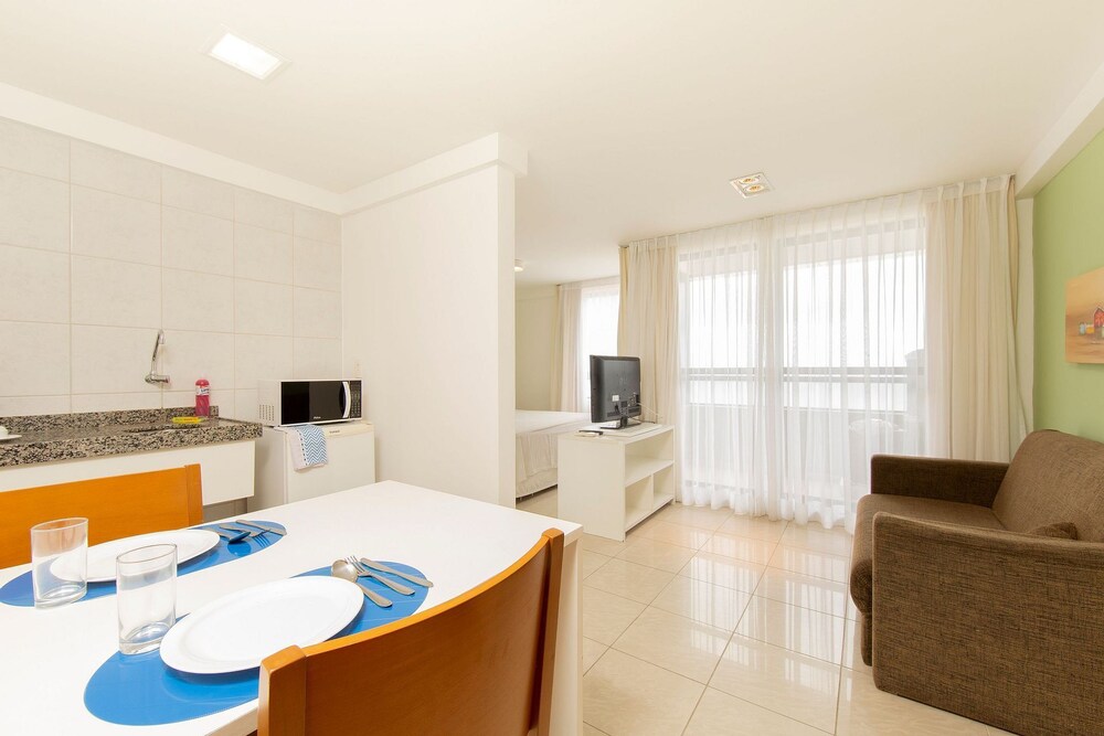 Flat by the sea at the Golden Tower in Natal by Carpediem
