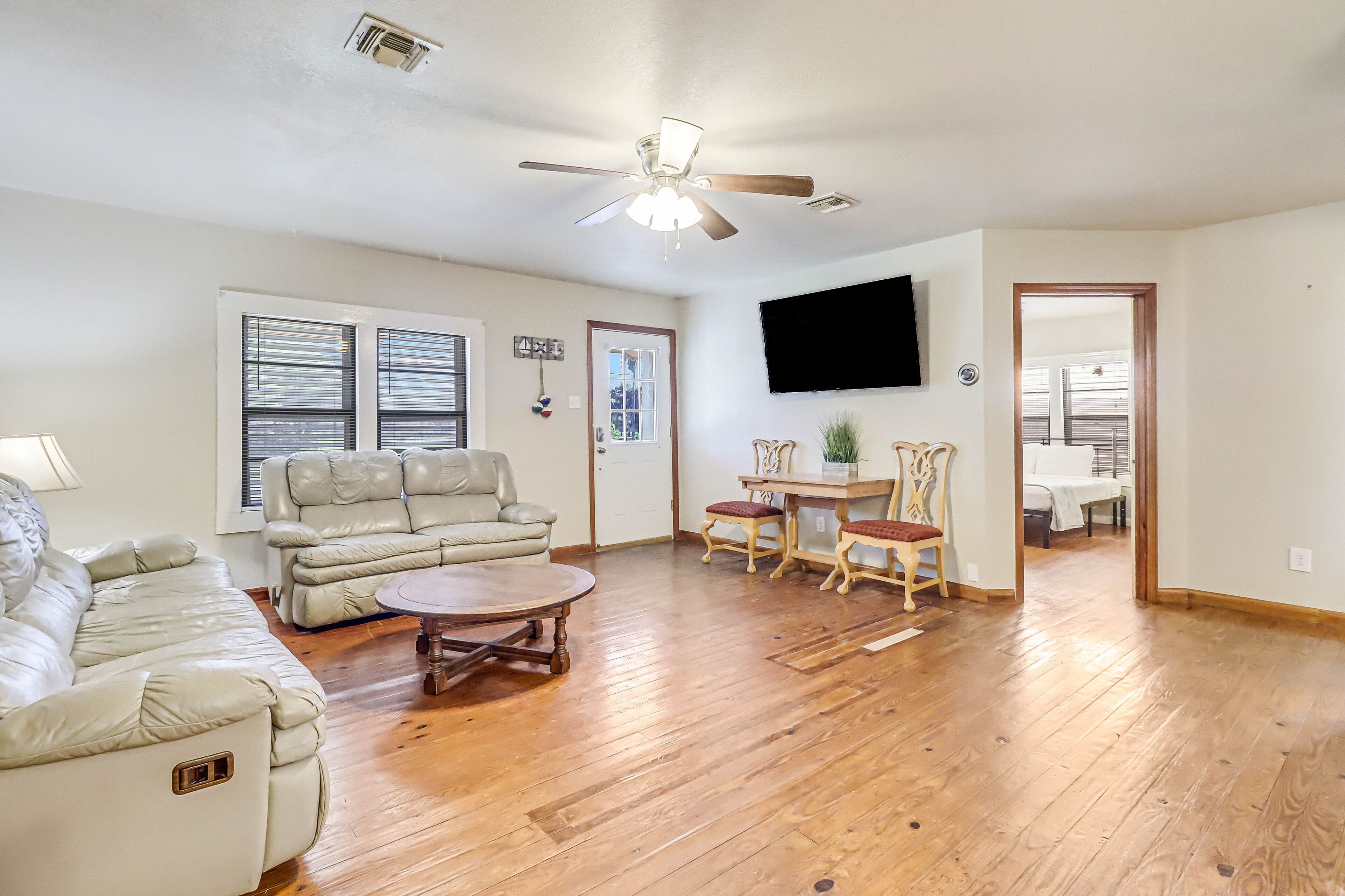 Corner-lot cottage with dog-friendly yard, AC, & W/D - snowbird-friendly