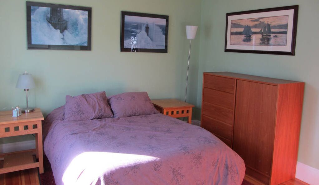 Large, sunny duplex on a quiet street - off-street parking and outdoor space!