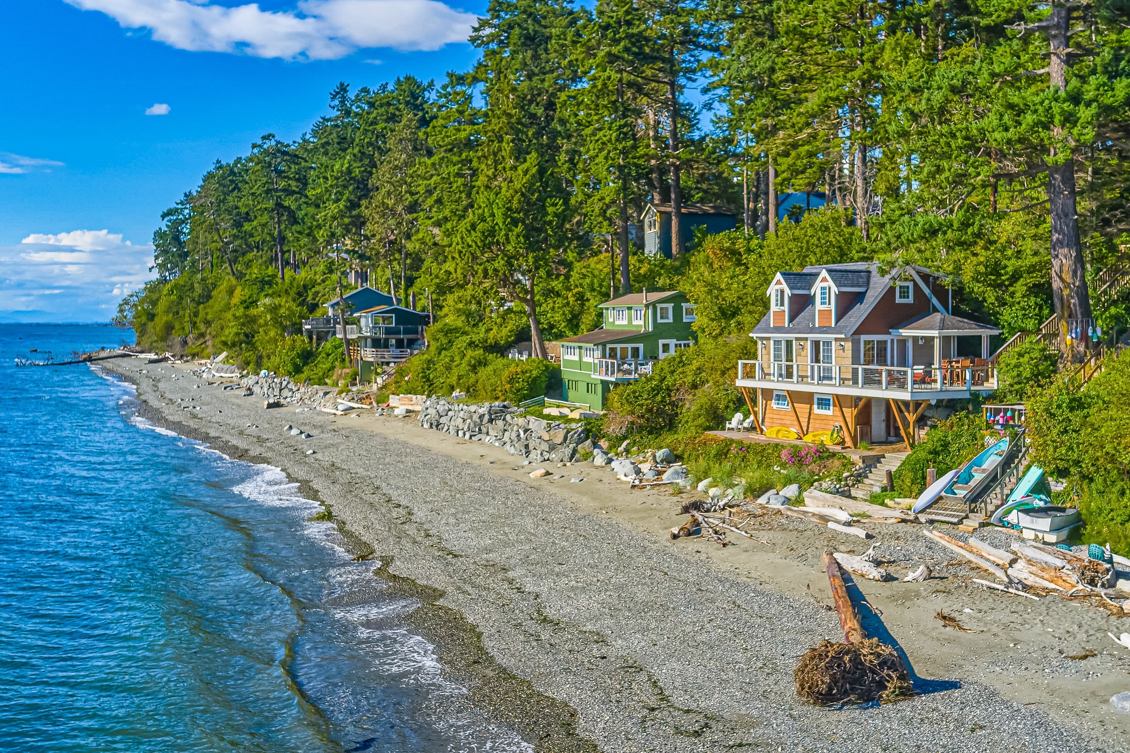 Beachfront studio with private patio, wood finishes, kitchenette, & partial AC