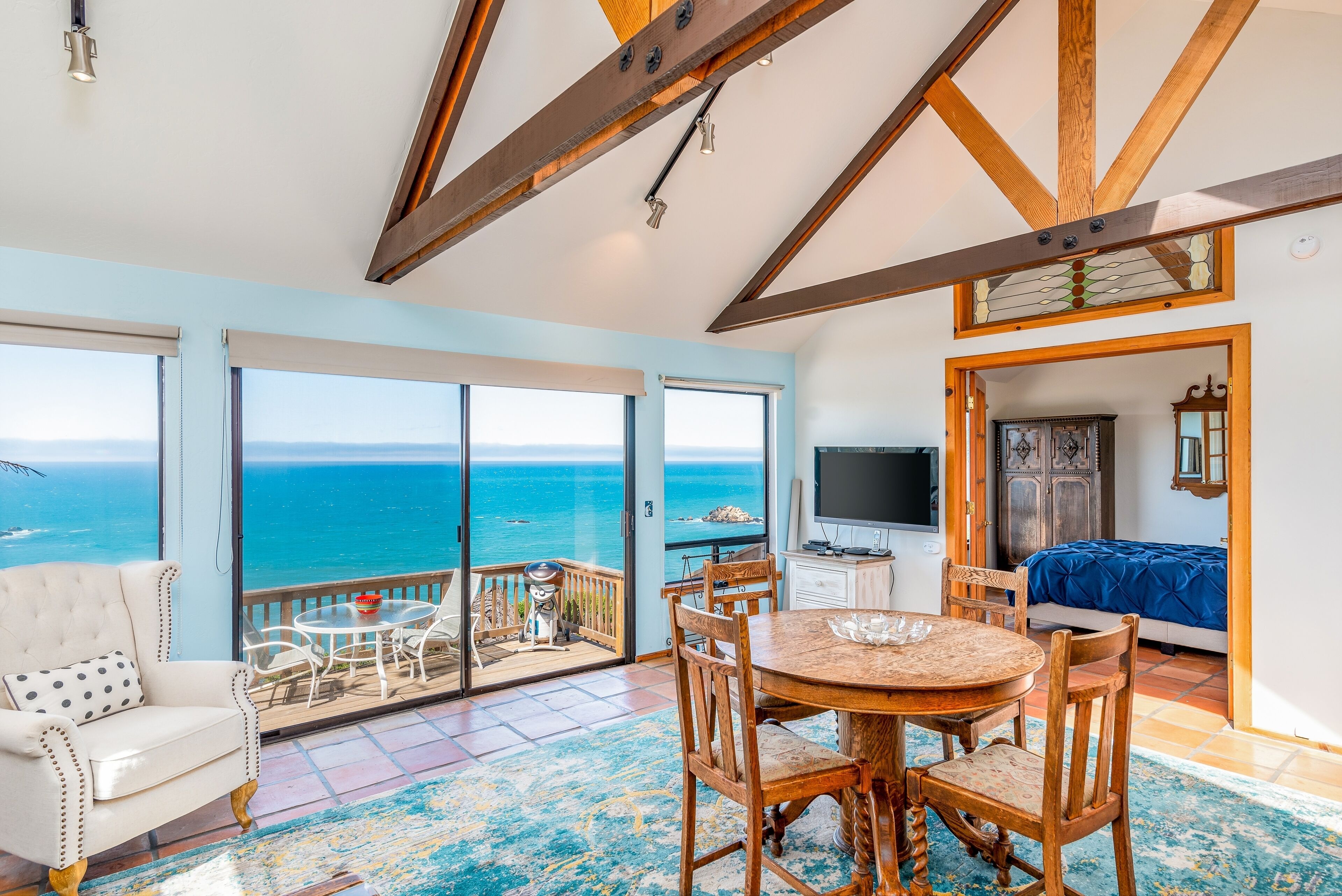 Dog-friendly, ocean-view cottage with private hot tub, deck, & free EV charger