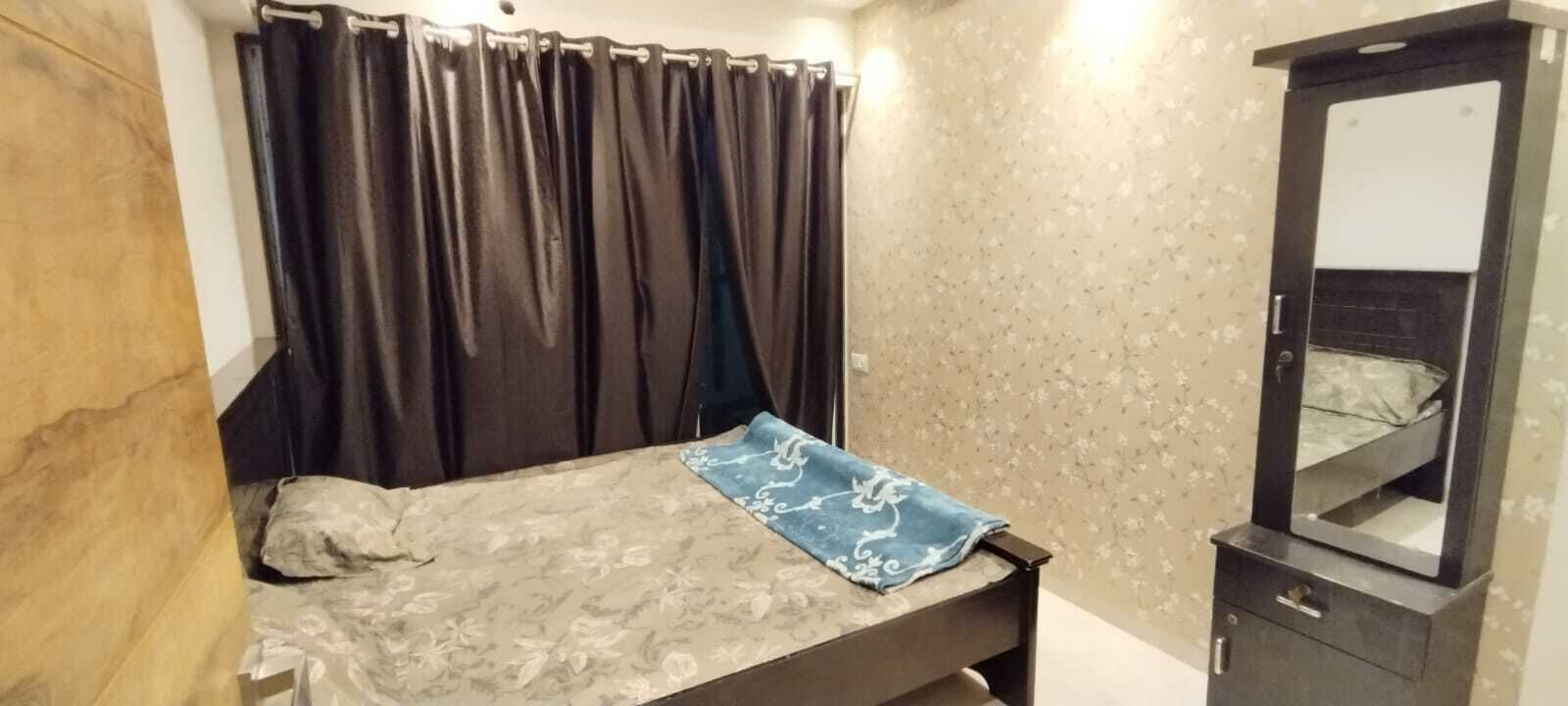 1BHK flat fully furnished bedroom, hallway with single bed balconies.