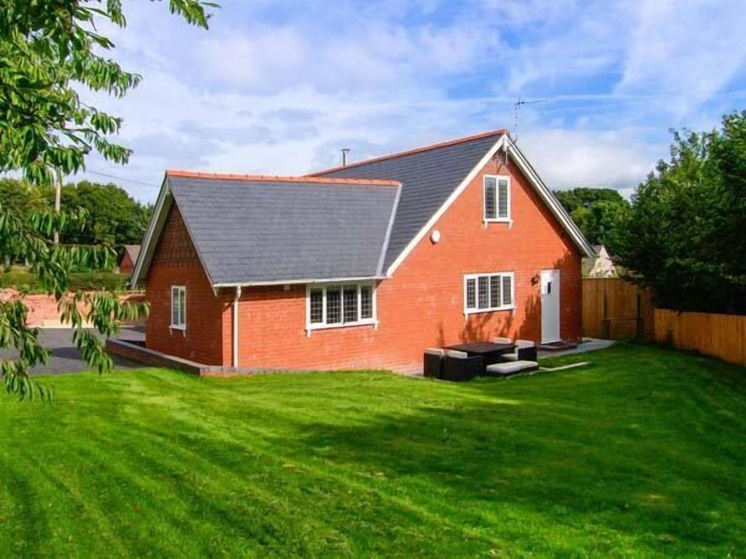 DOUGLAS COTTAGE, with open fire in Penycae