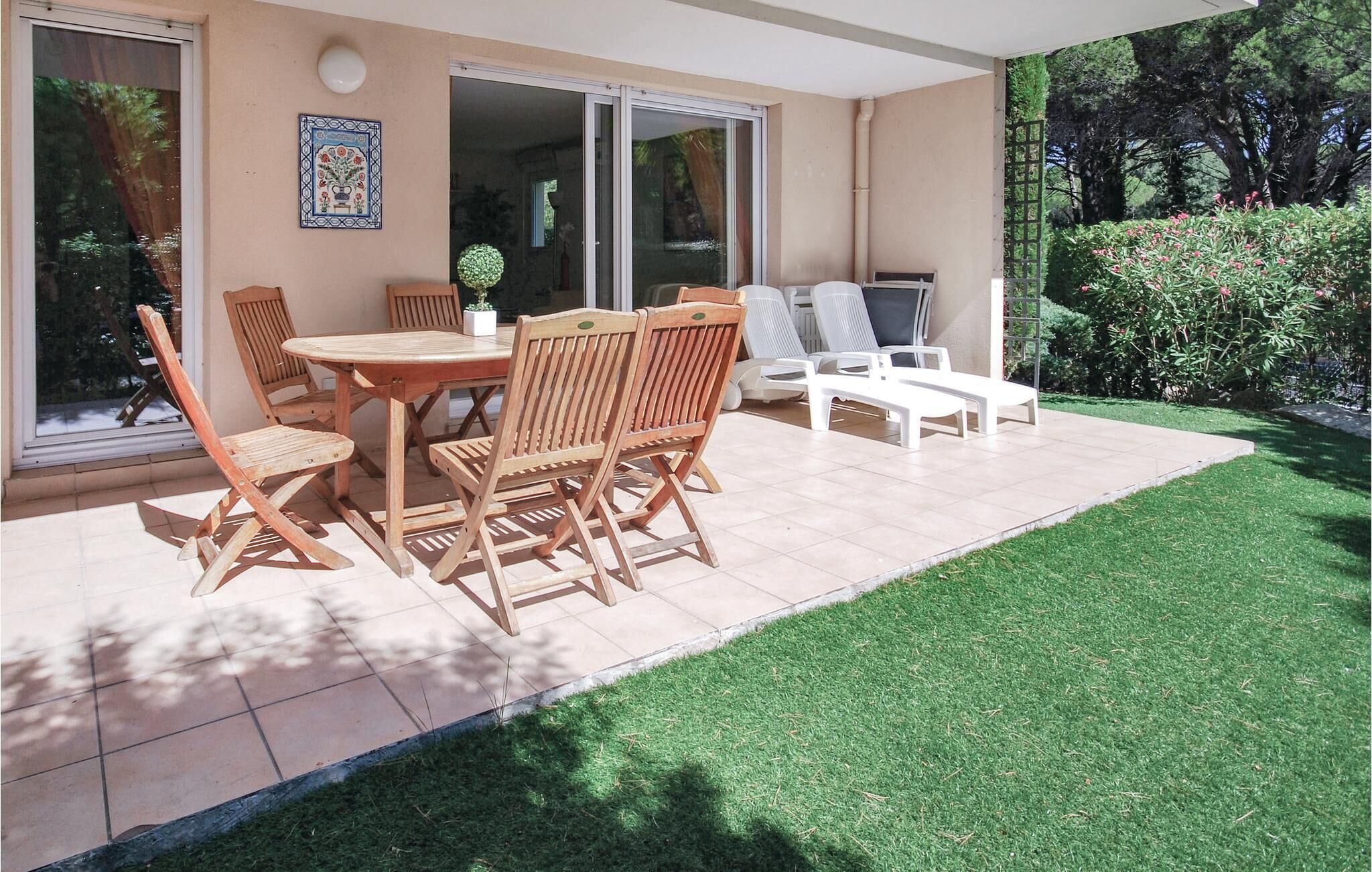 This beautiful apartment is located on the first floor, where it opens onto a garden.