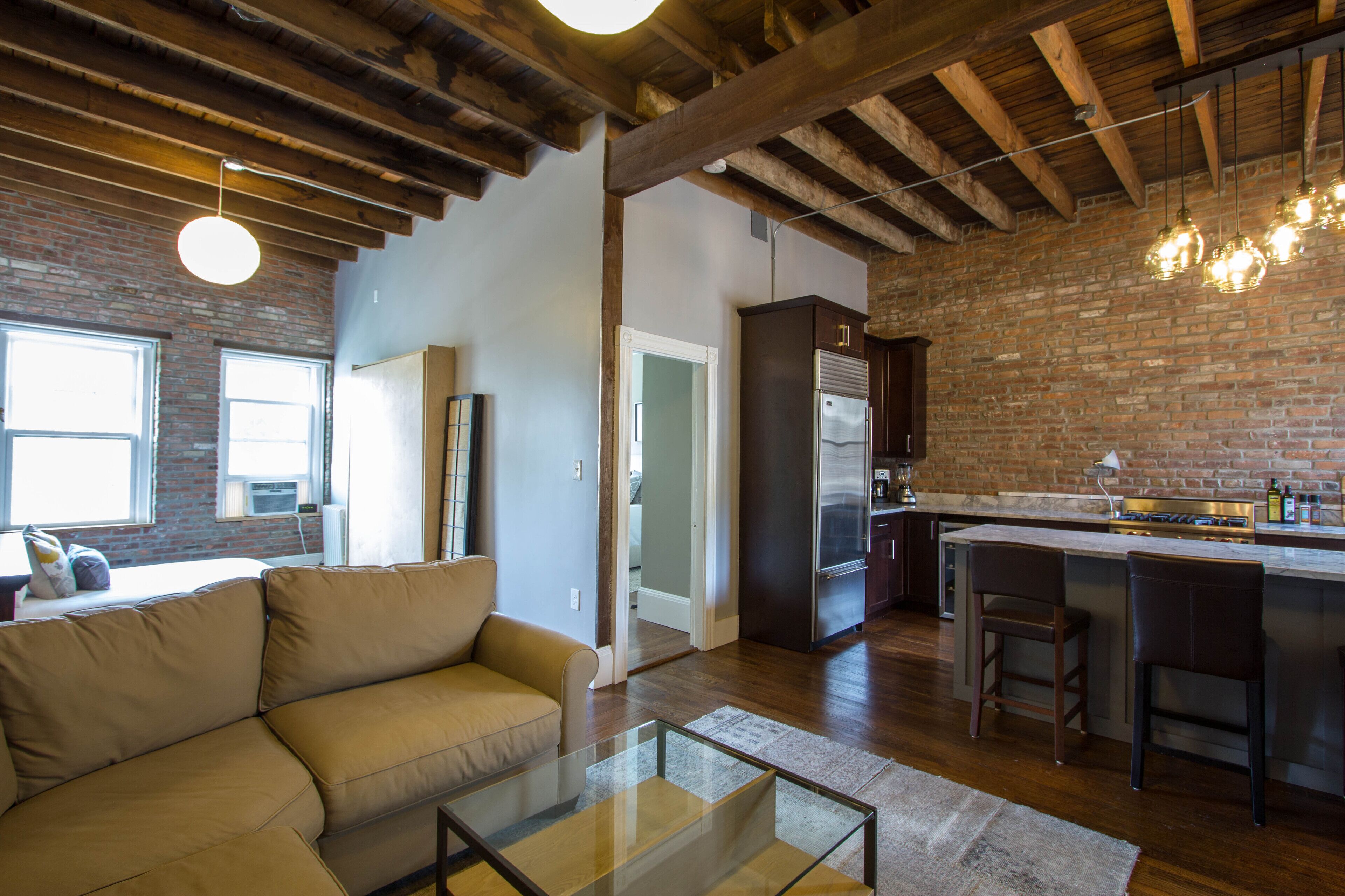 Modern 2-bedroom loft condo near BC, BU, hospitals & train w/ parking available.