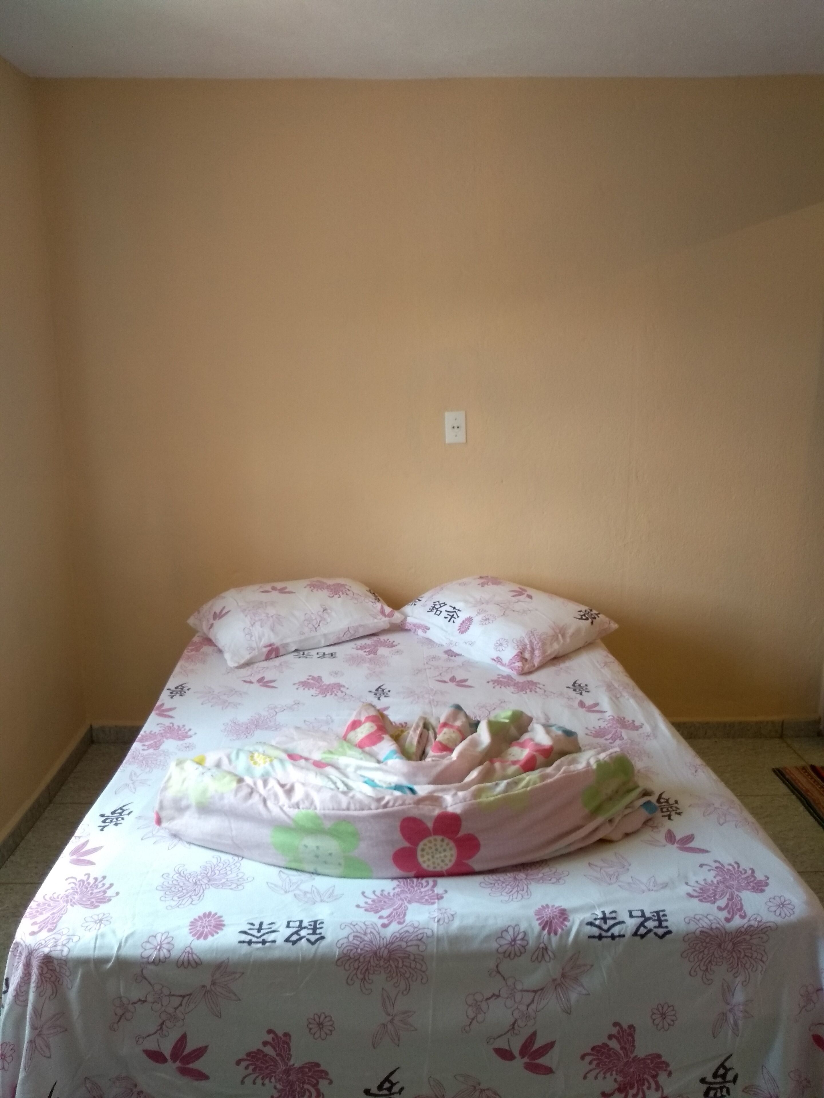 Room with double bed, bathroom and TV