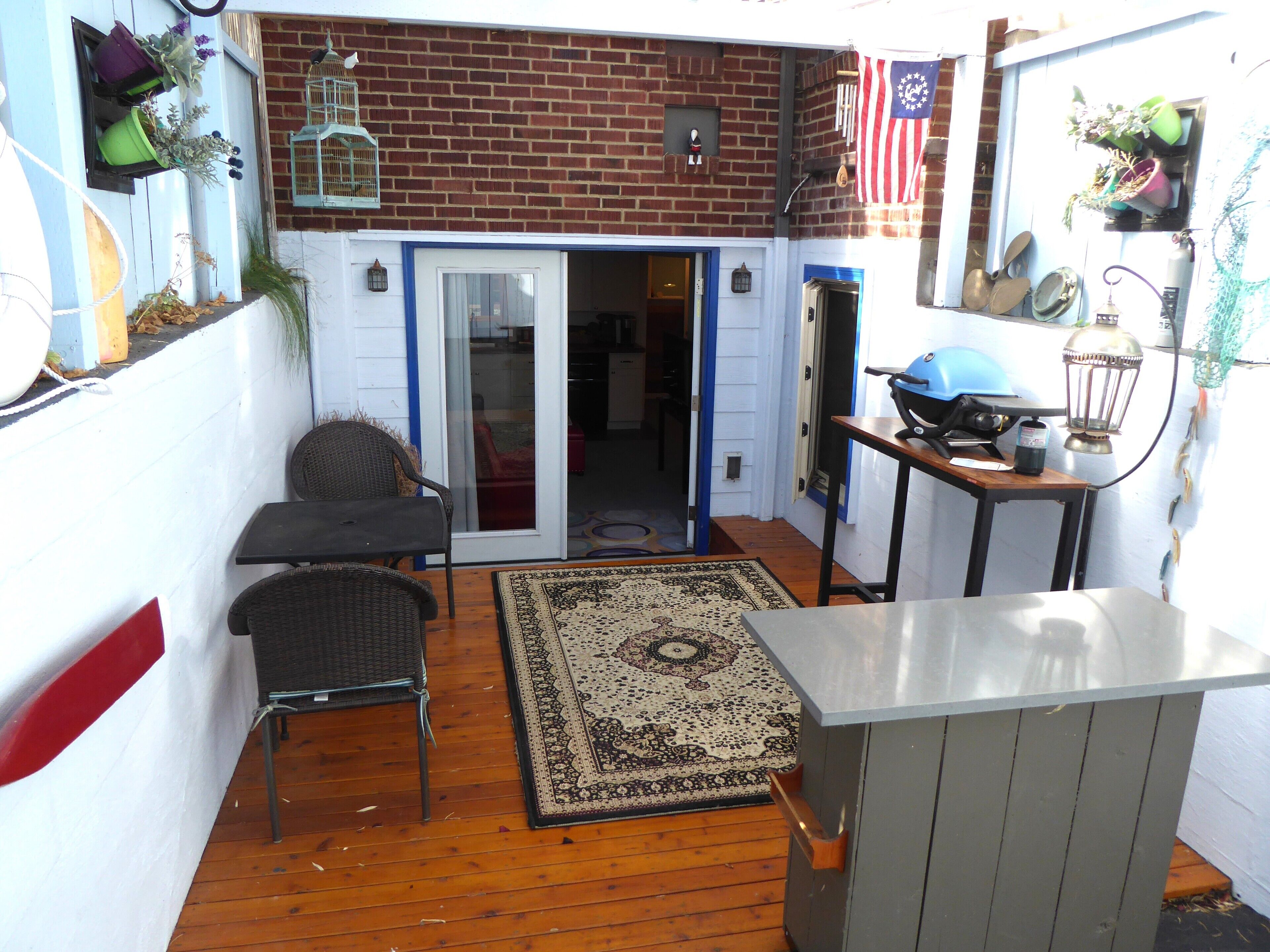 PORTHOLE:  Private, Peaceful with an outside locked patio, perfect for bikes.