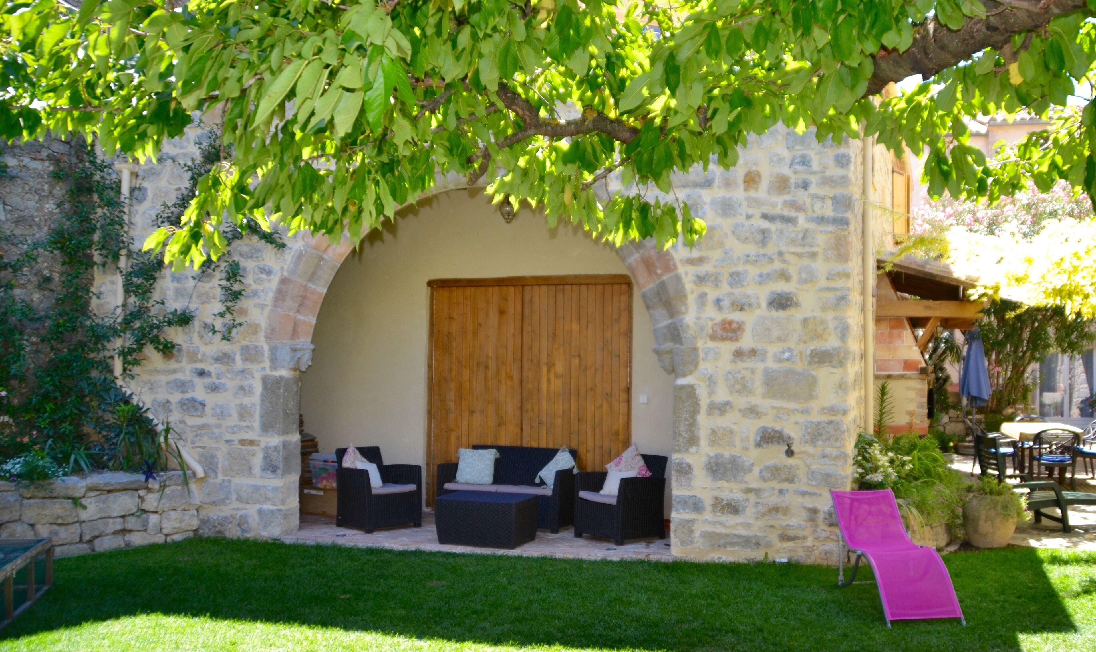Holidays in Lagrasse. Stunning medieval apartment set in walled garden with pool