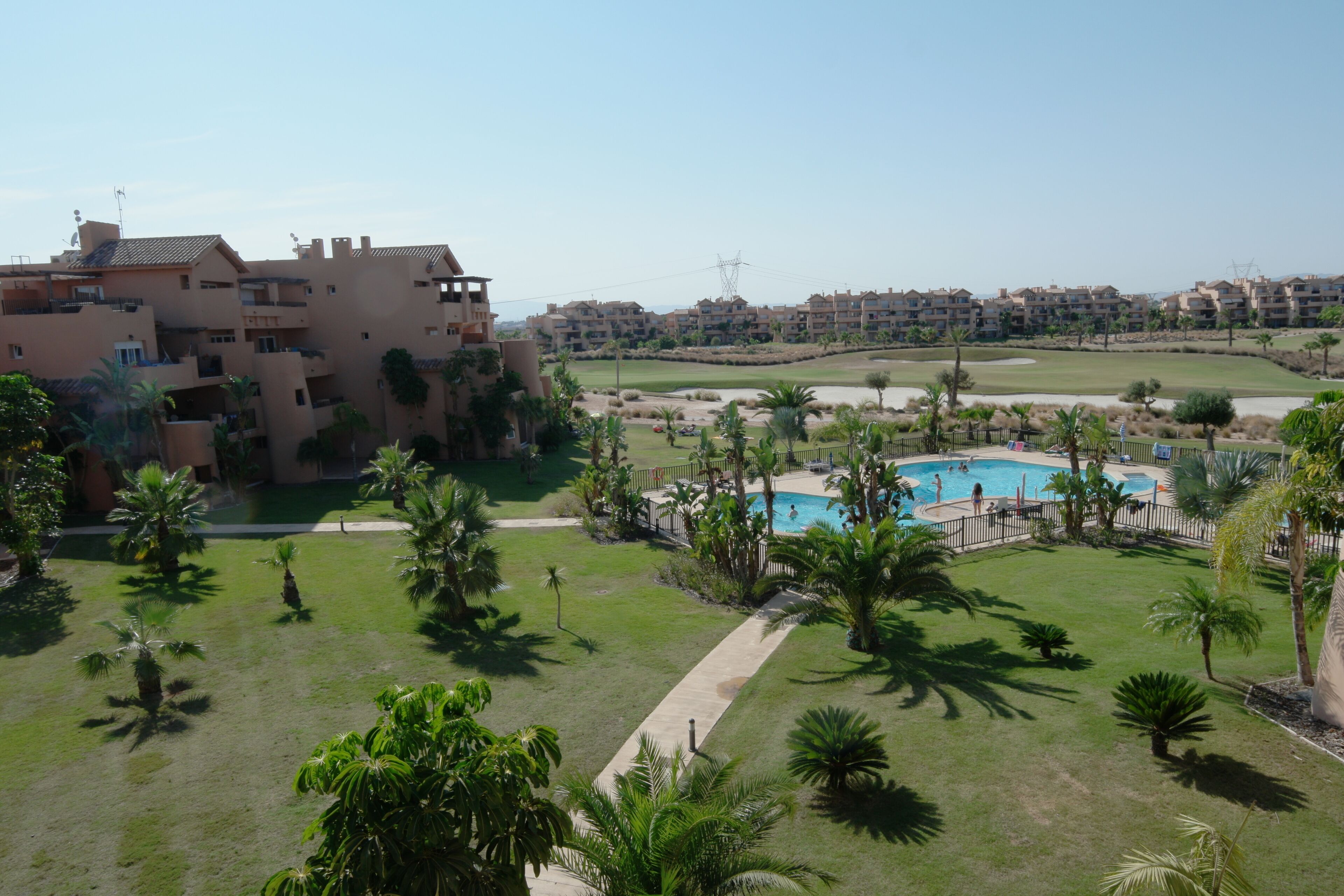 Family friendly apartment in a golf resort with pool. 6 km from the coast.