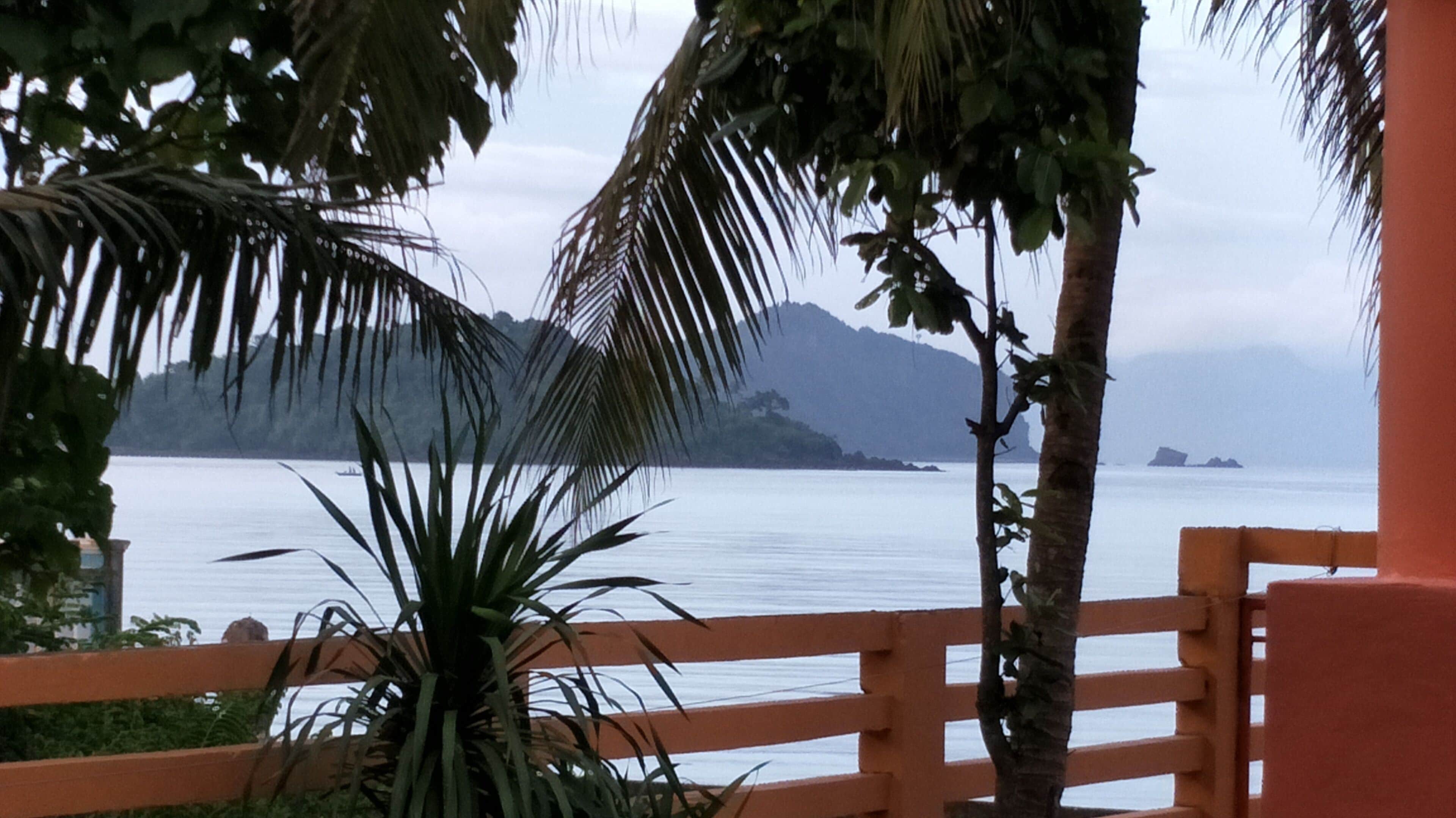 Relaxing beach side condo with mountain and island views.