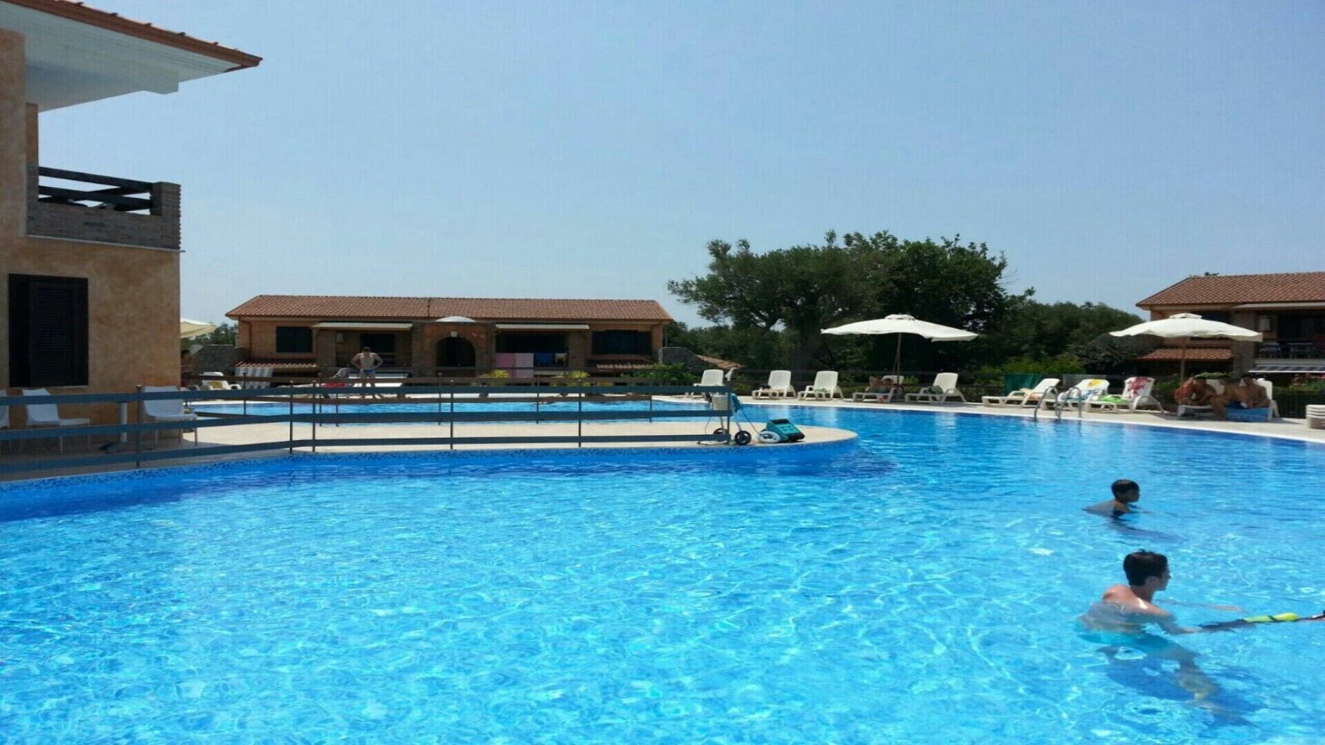 Apartment in park with swimming pool