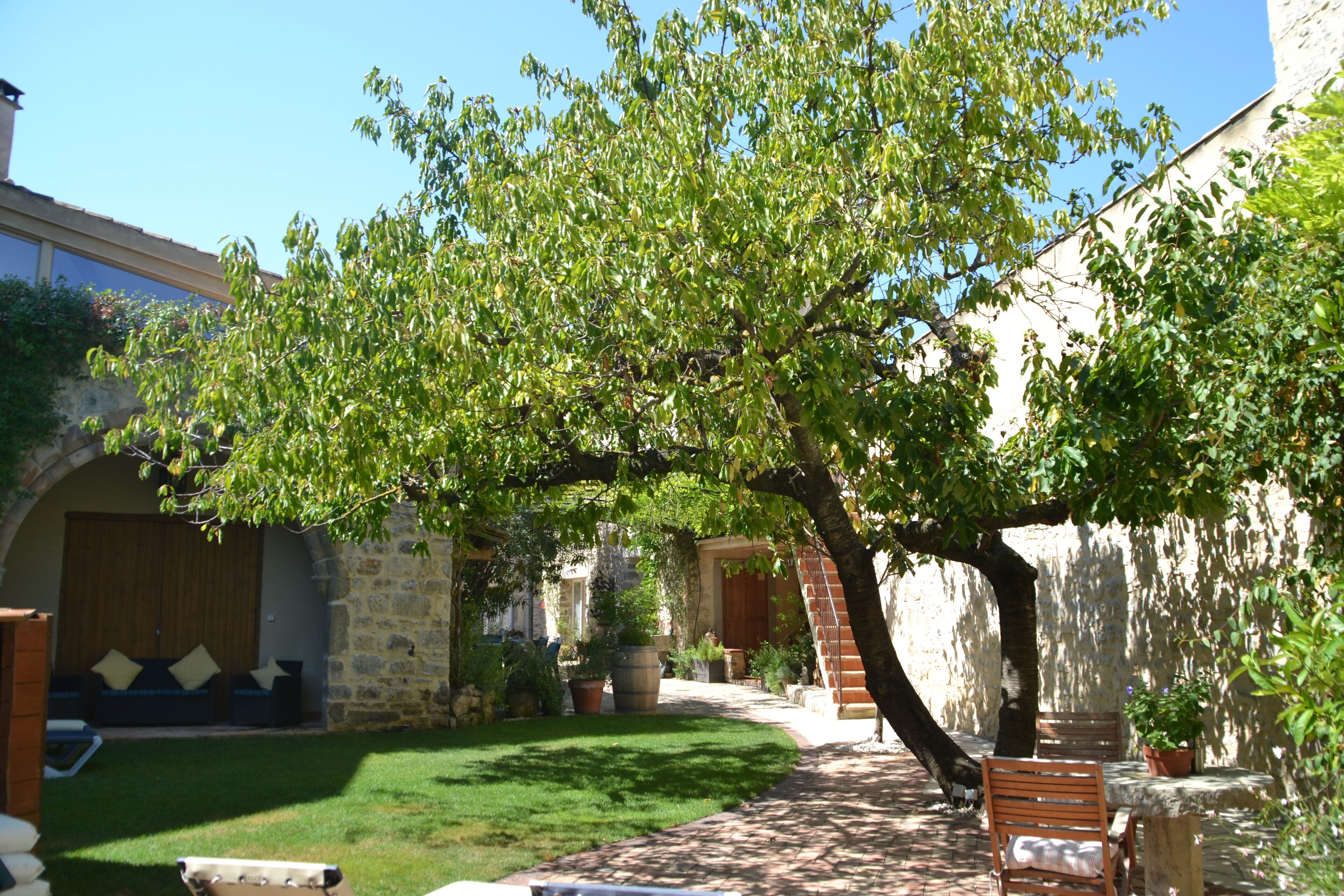 Holidays in Lagrasse. Stunning medieval apartment set in walled garden with pool