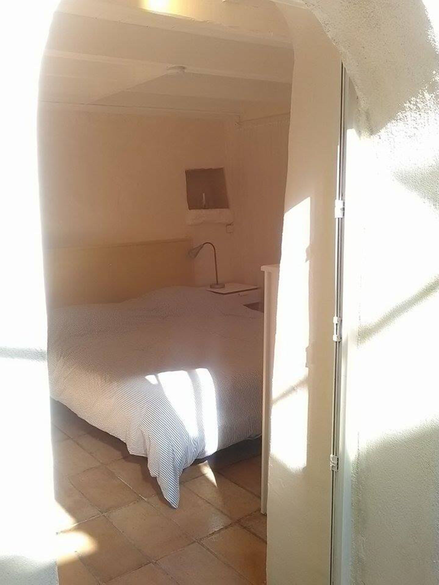 Near Uzès, room with patio and kitchen area in charming house