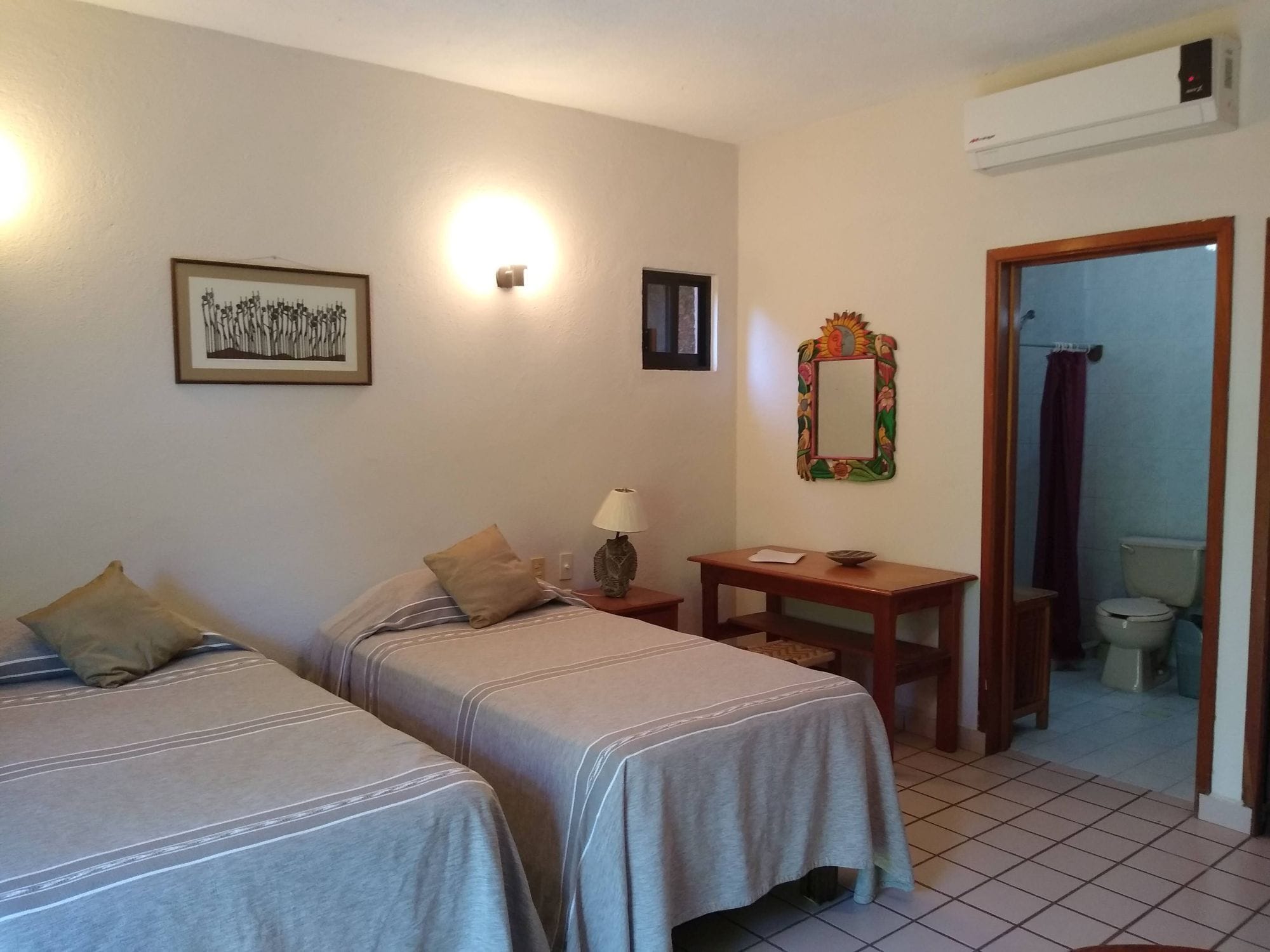 Spacious room in family guesthouse walking distance to La Ropa beach