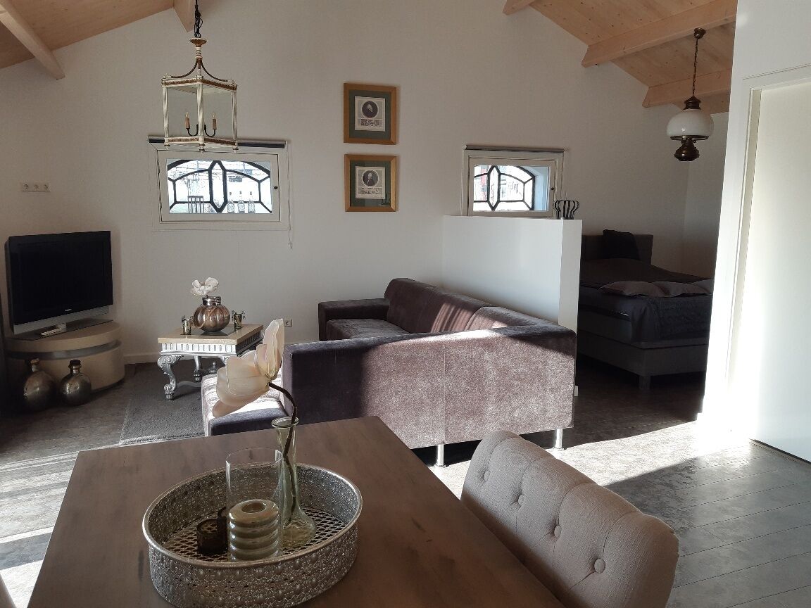 Classy room with a beautiful view over the landscape of the green heart