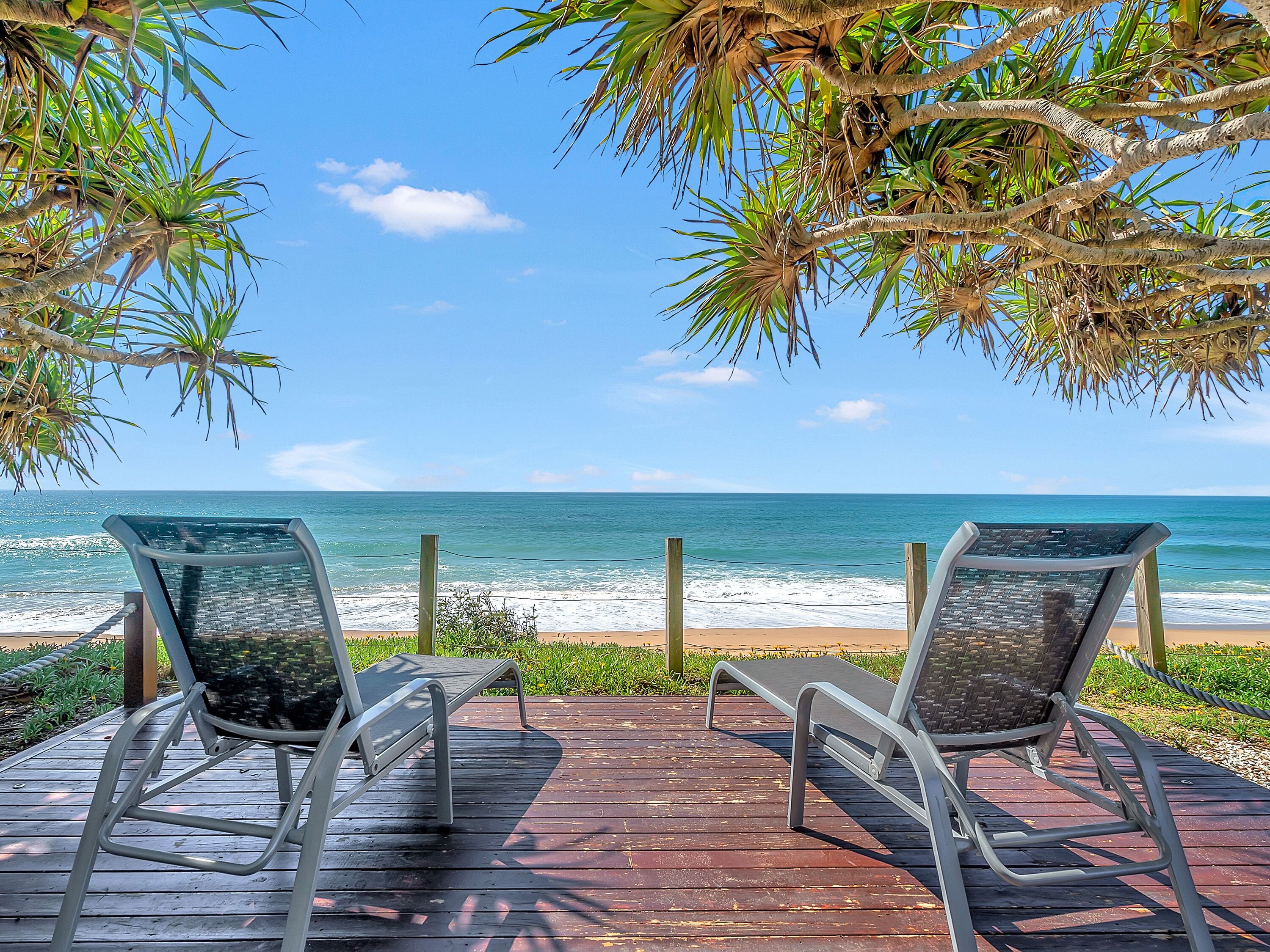 Luxury condo, NE facing with ocean views, within 50m of pool and beach for walks