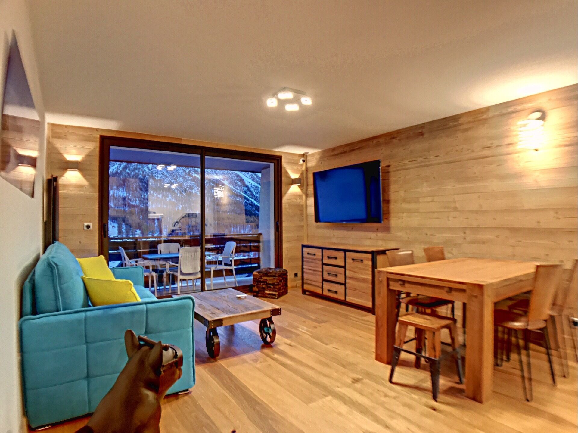 New chalet style apartment with snow front view