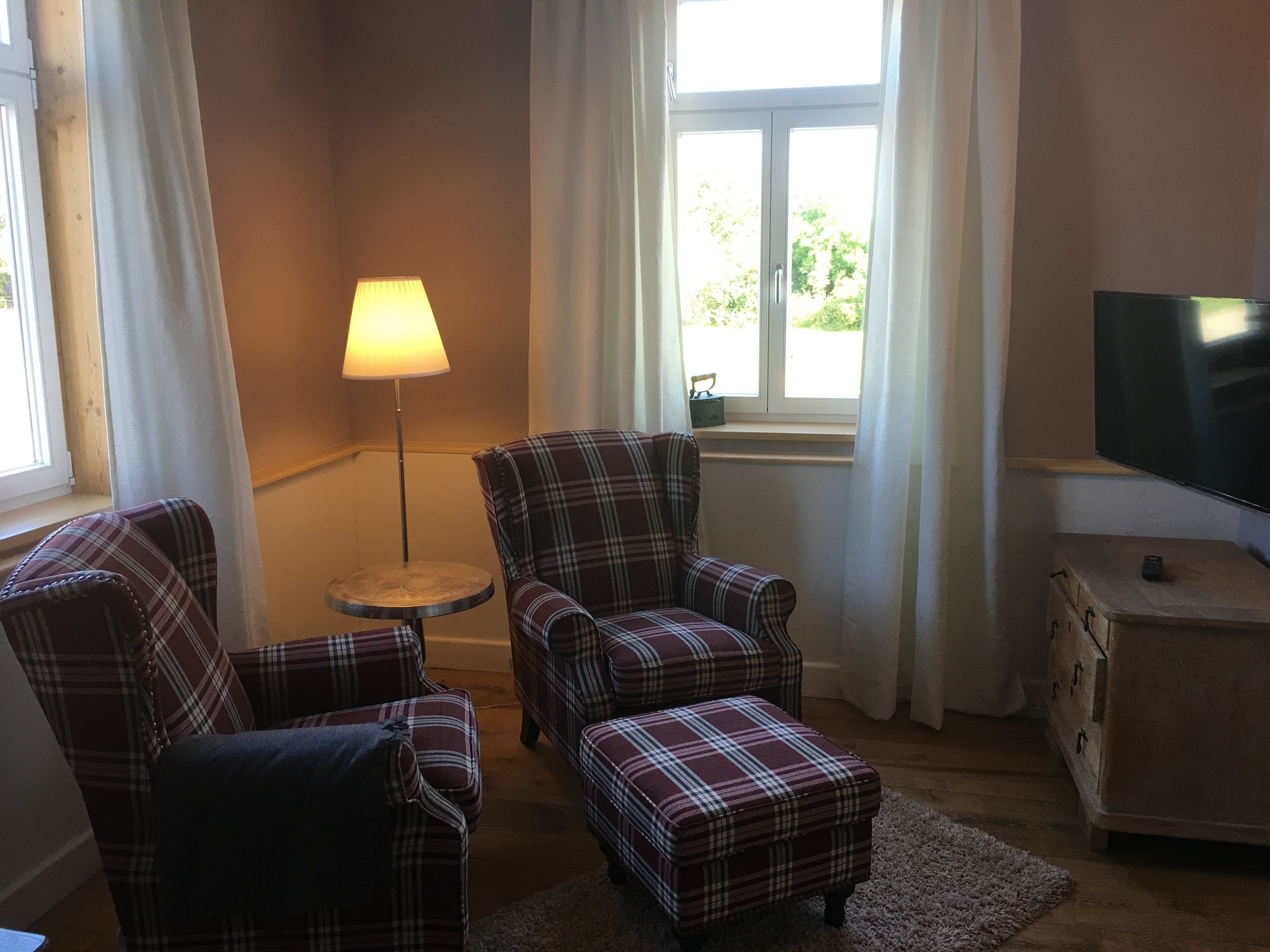 Living in the mill building, surrounded by green meadows.