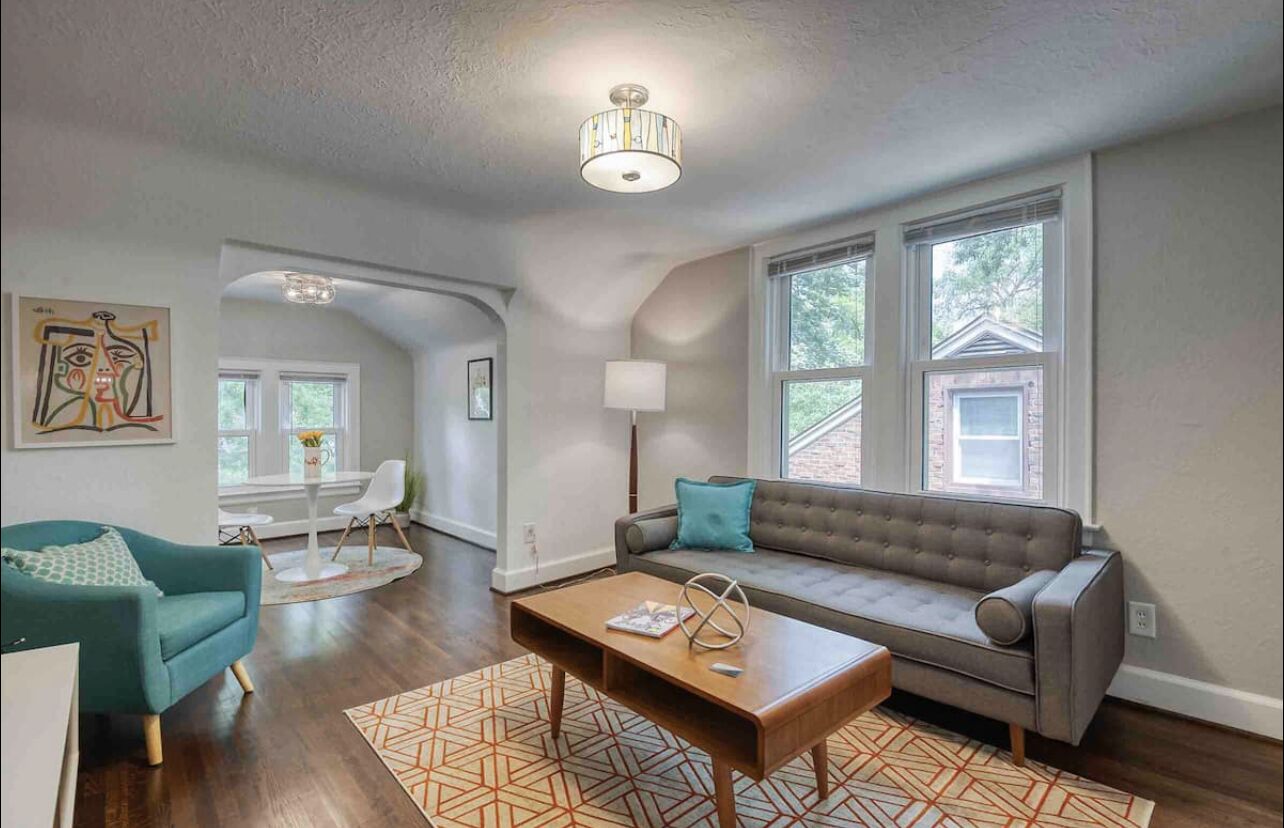 Walk to town from gorgeous, modern upper apartment.