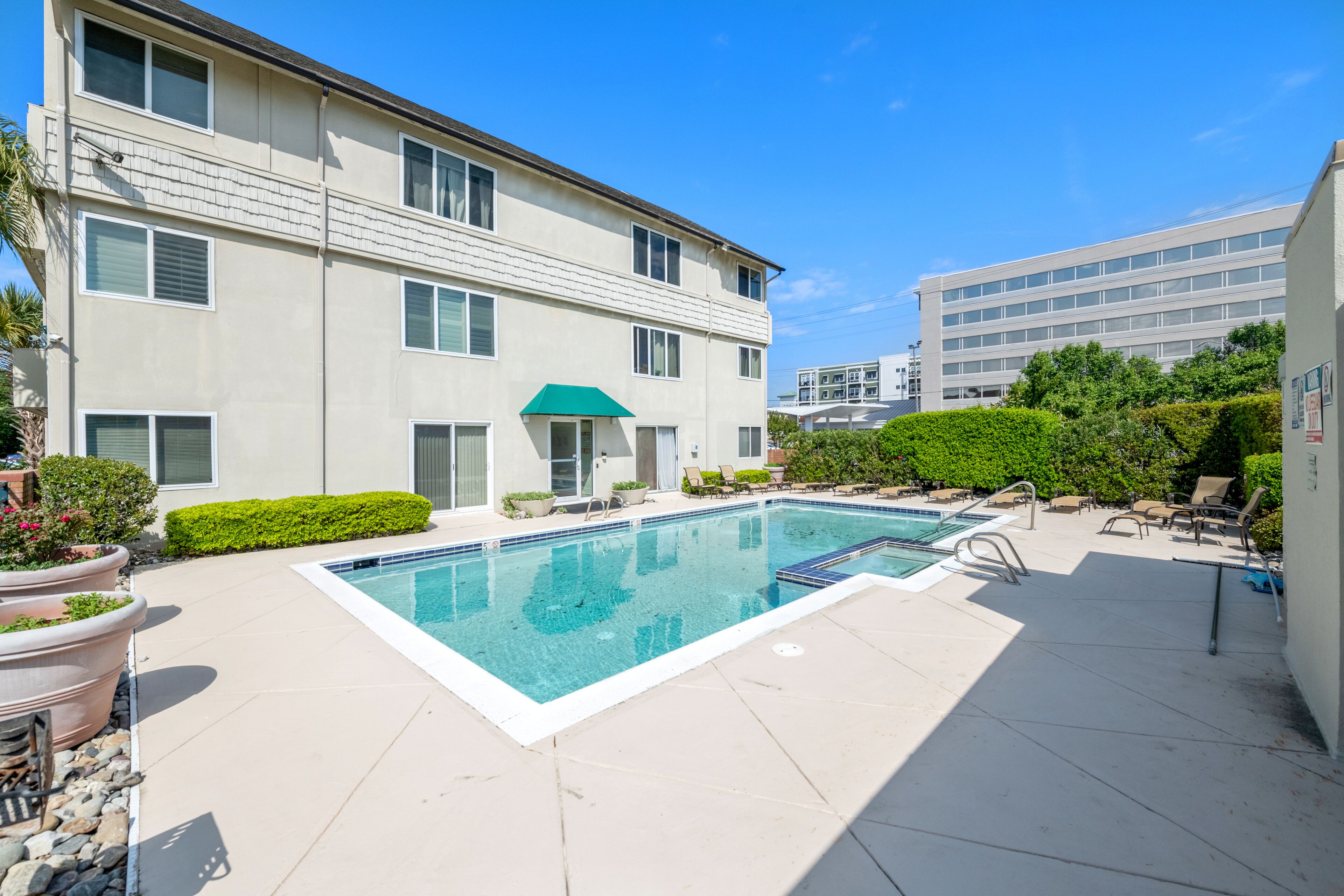 Beautiful Luxury Condo 1.5 blocks from Oceanfront, private parking  and a pool.