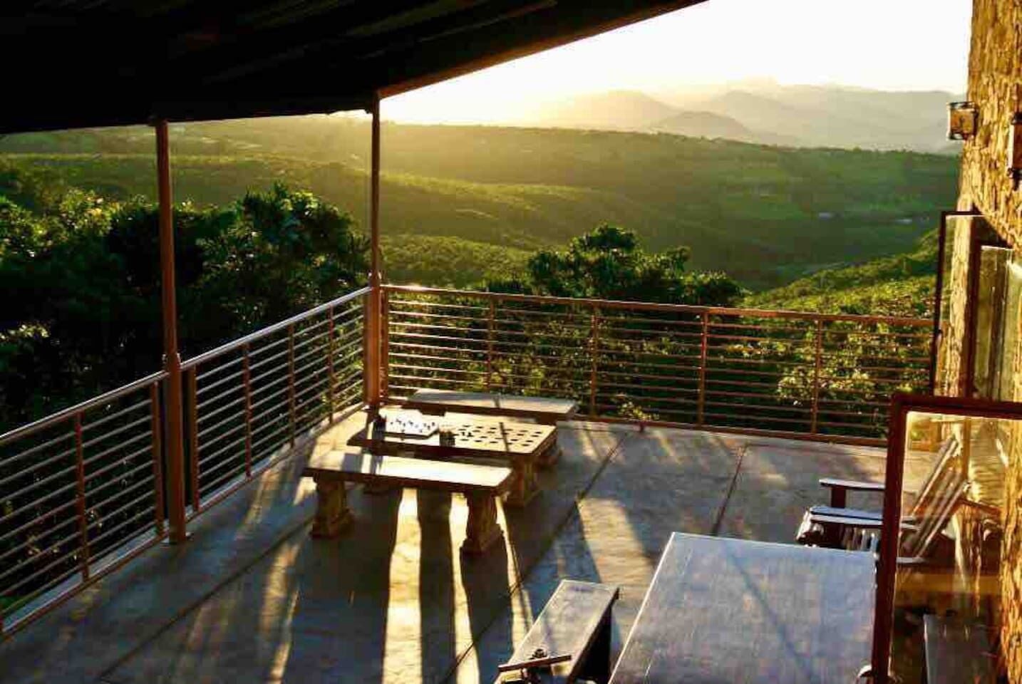 Rustic stone walls with modern conveniences in an African setting.