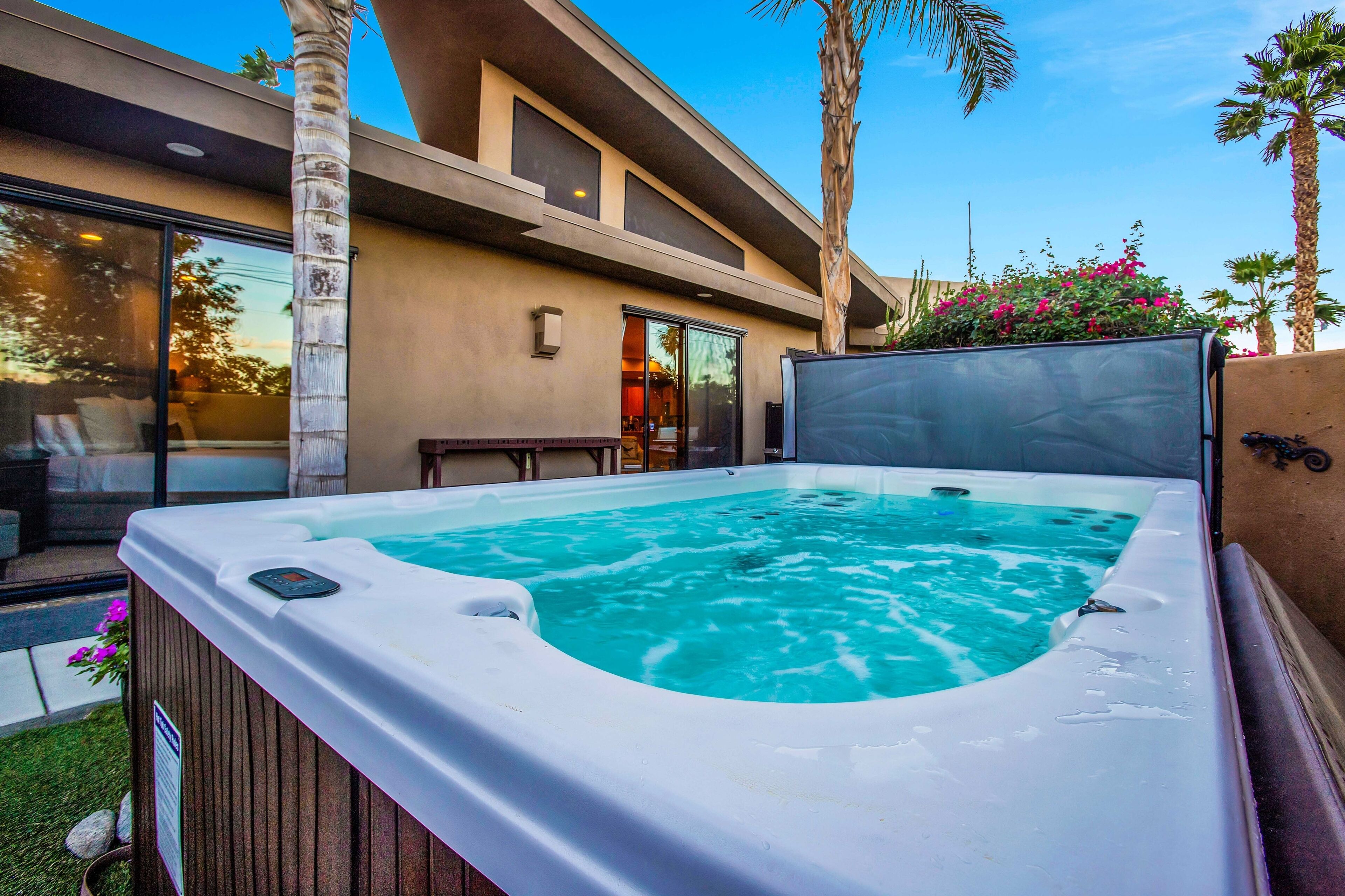 Stylish townhome with private hot tub, east-facing patio, & great location