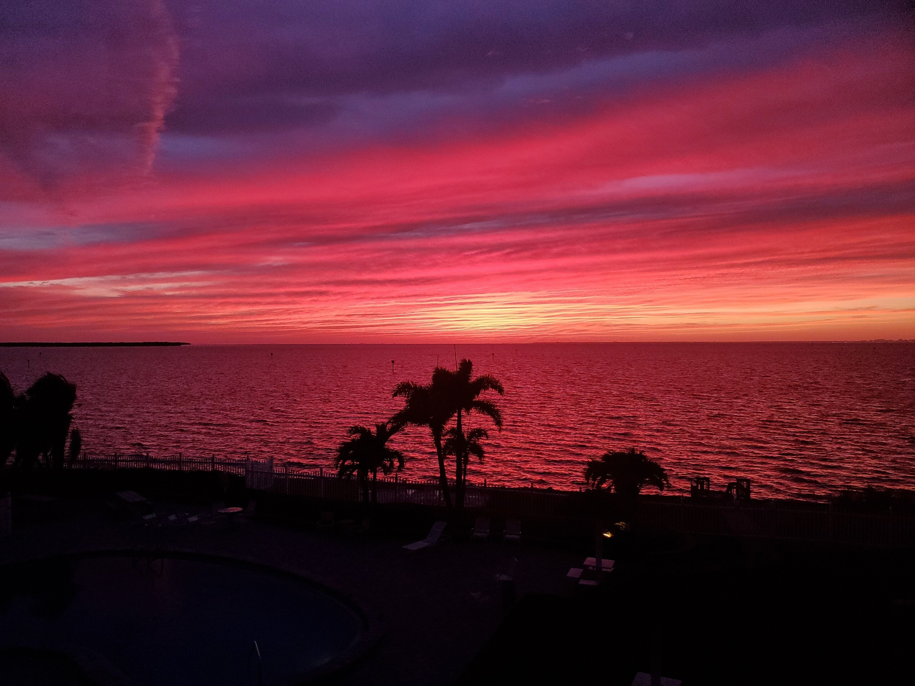 Stunning Sunsets from this beautiful 2/2 Condo!  Walk to Restaurants & Tiki Bar