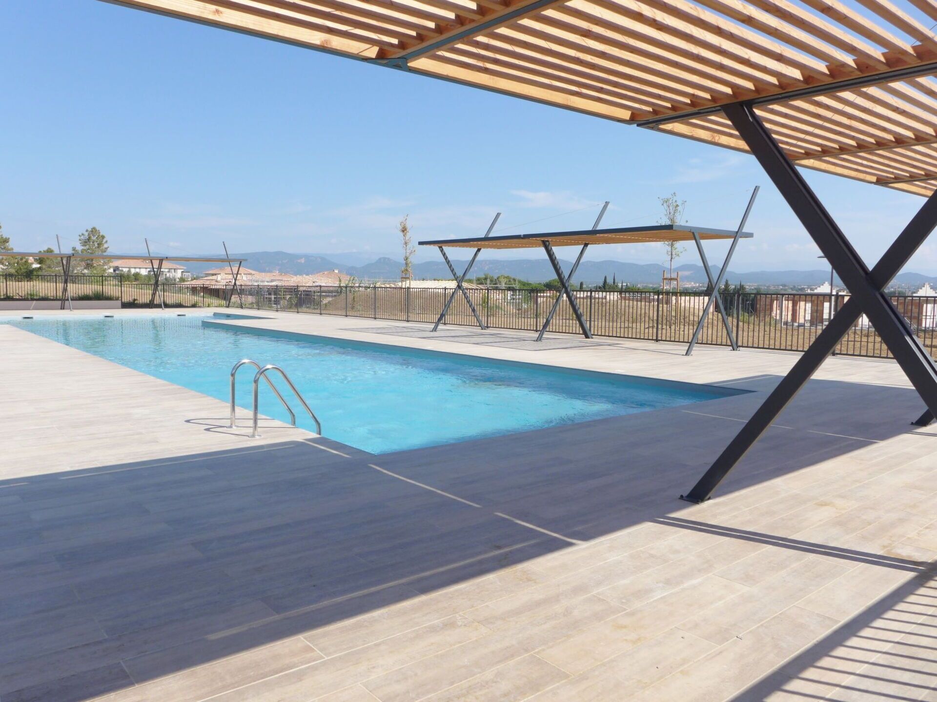 Cosy apartment for 4 guests with pool, WIFI, TV, patio and parking