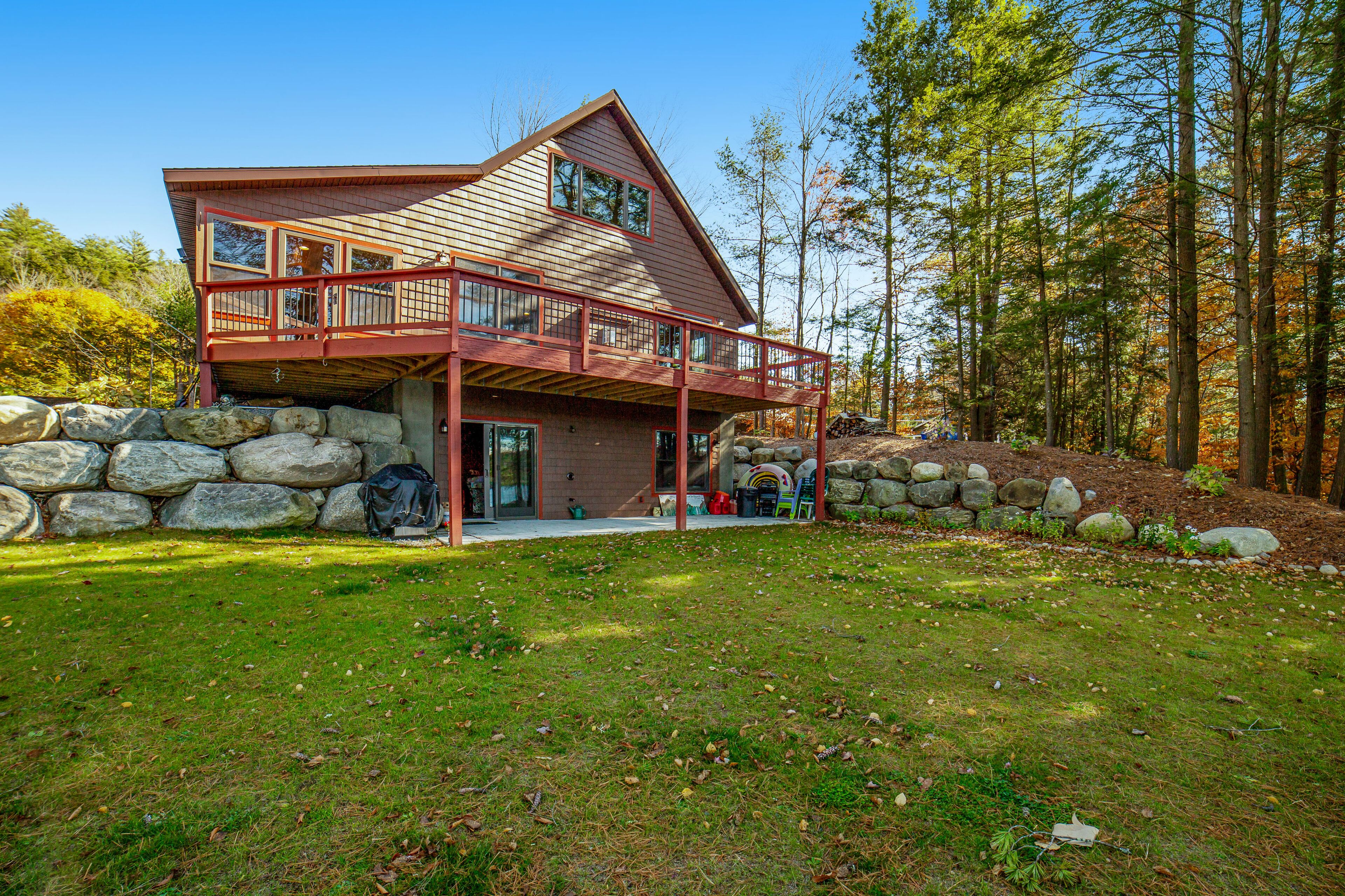 Gorgeous Lakefront Home with a Fire Pit, Two Living Areas, and a Sunroom