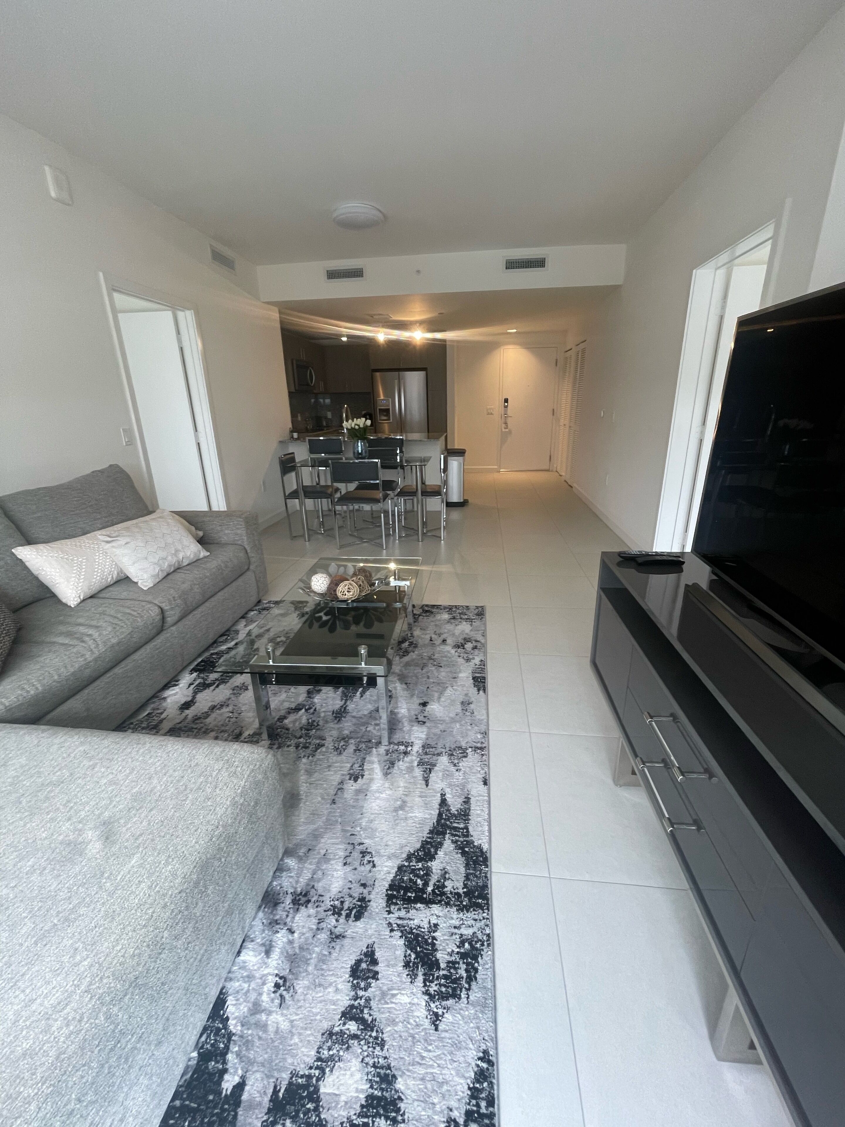 Your perfect 2B 2B modern apartment for a Family Getaway in Downtown Doral