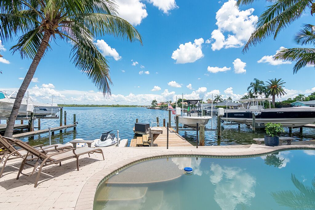 Waterfront with views of Pool, Intercoastal Water and use of 19ft Boat