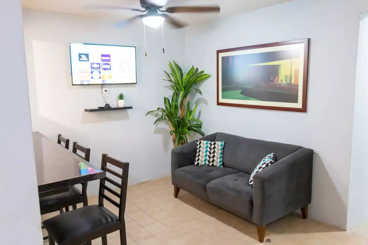 Comfortable modern apartment conveniently located for shopping and dining.