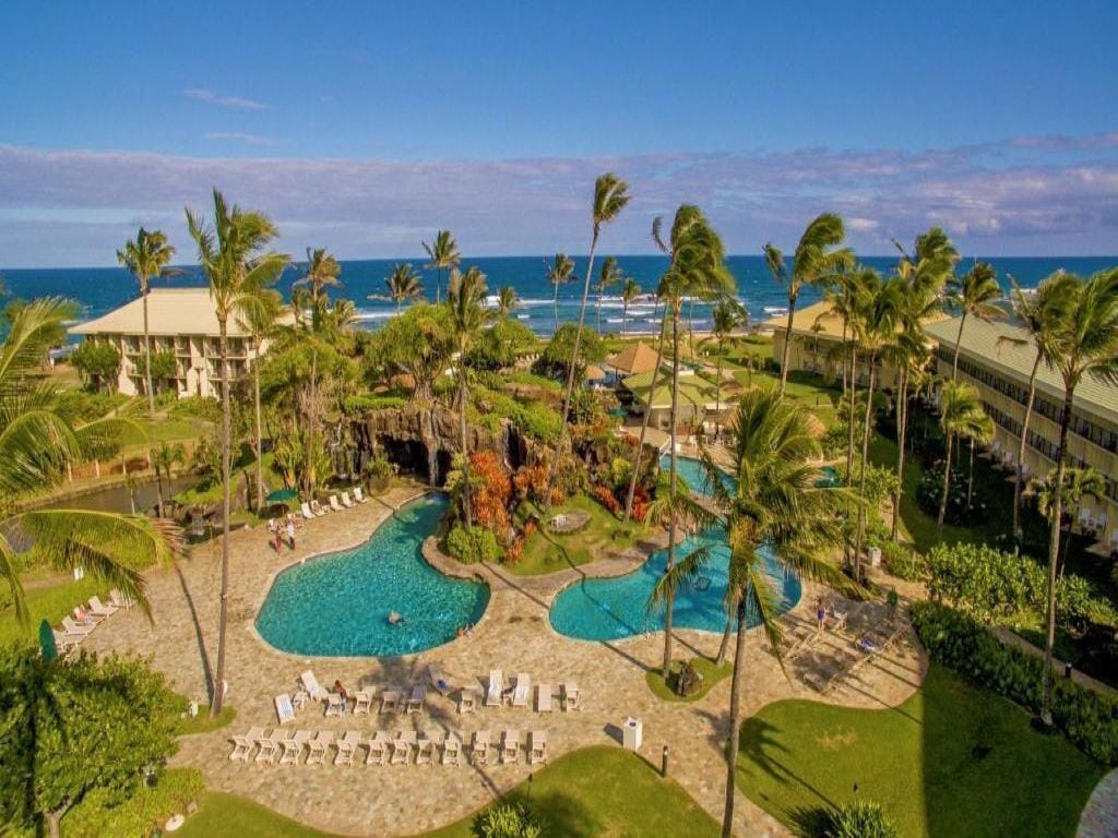 Oceanfront Kauai Beach Resort, 4 Pools, 75 foot Water Slide, Restaurants on site
