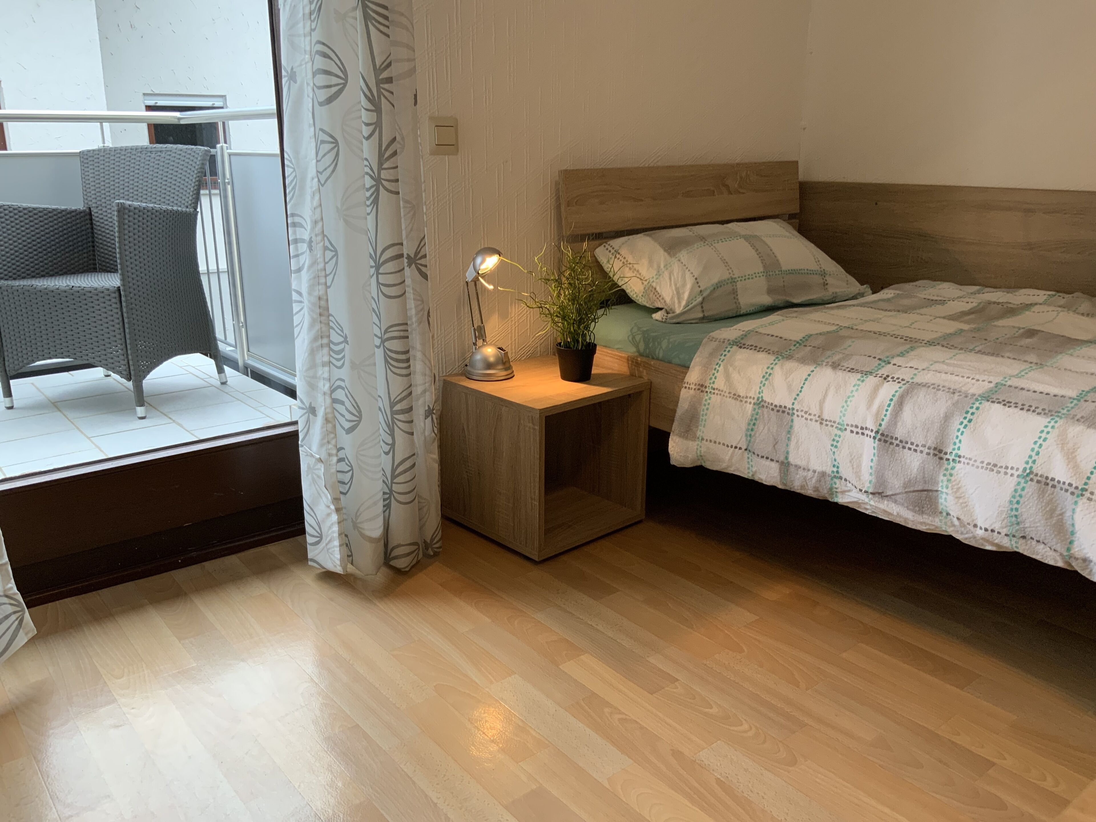 Room for fitters with shared bathroom and balcony 
