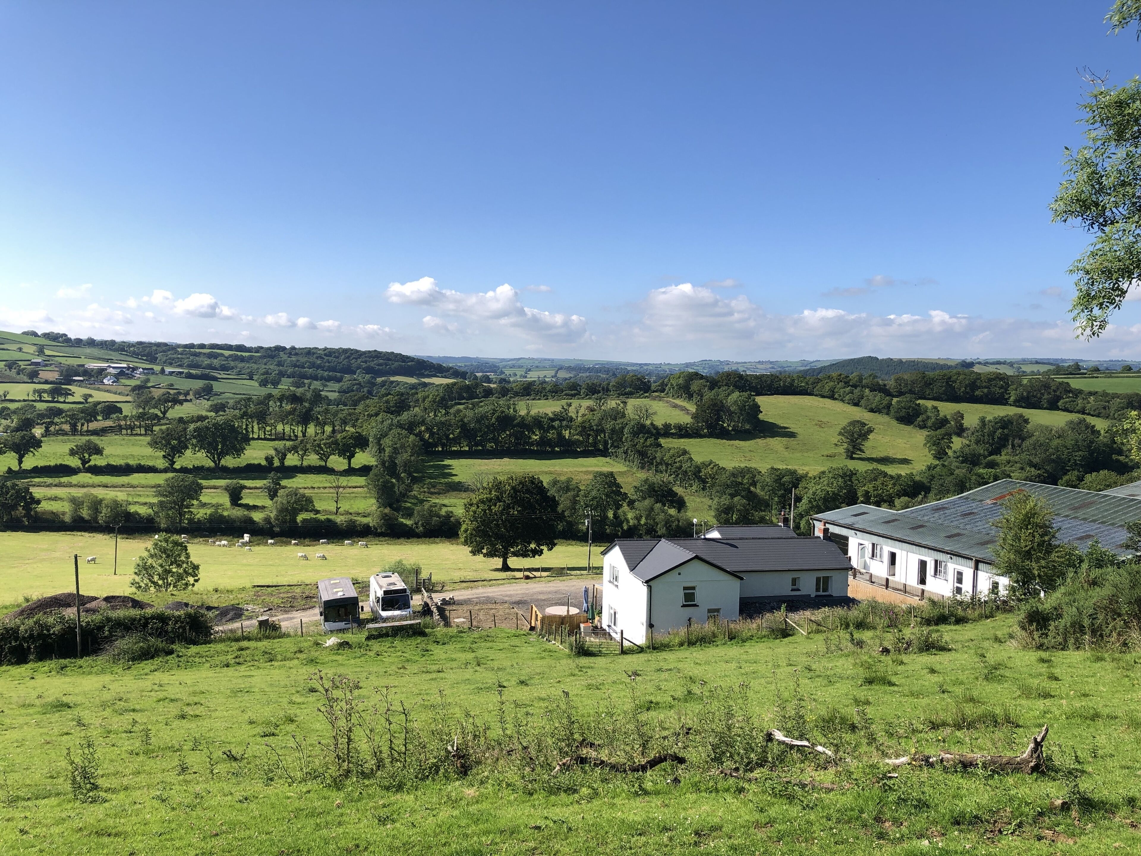 Farm setting with large living areas and wood fired hot tub