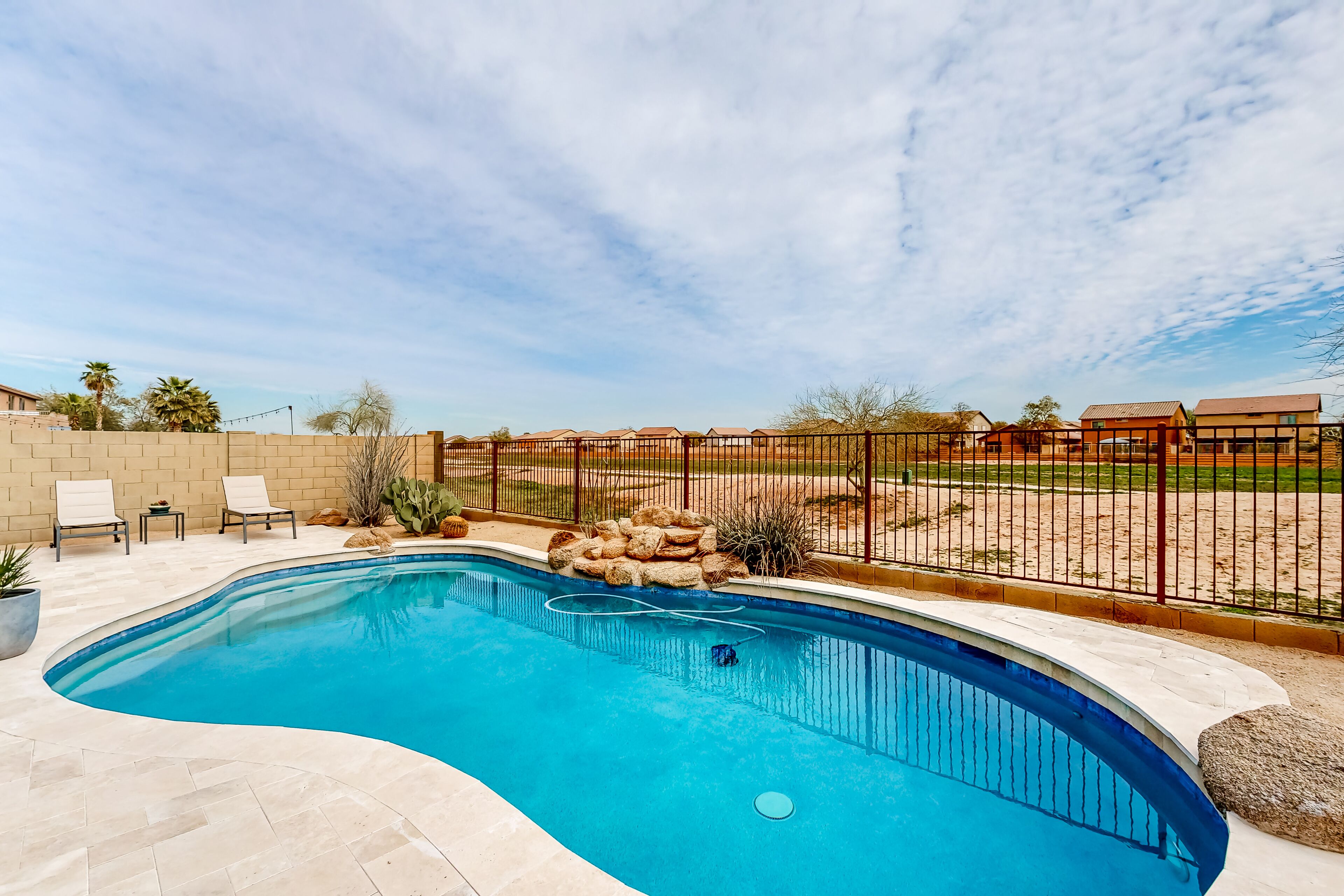 Inviting dog-friendly home with pool, enclosed yard, firepit, fast WiFi, & W/D