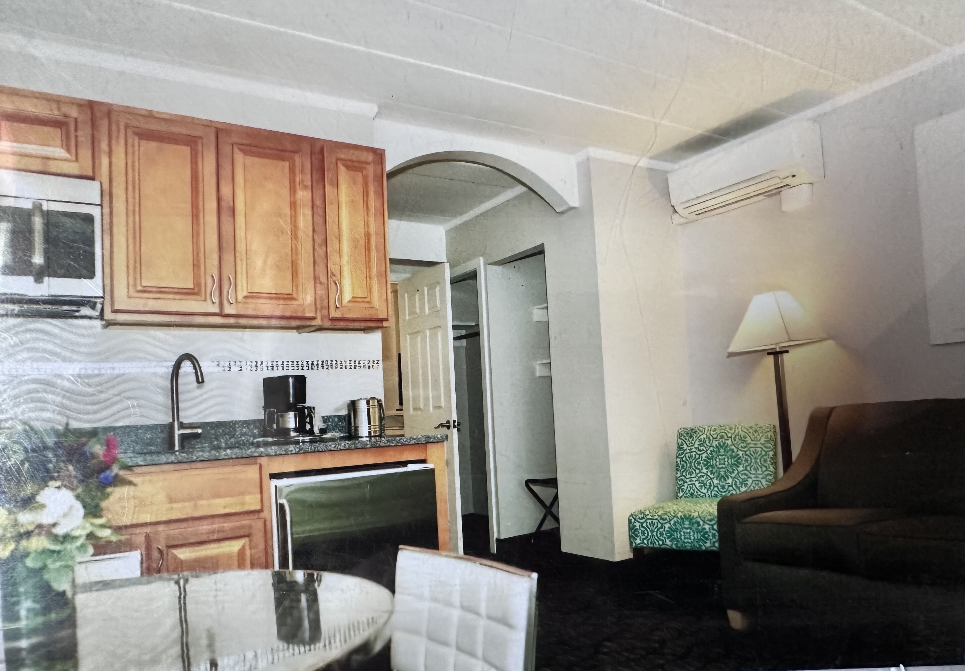 Oceanfront Property Suite Kitchenette with a Private Bedroom and a Queen Bed 