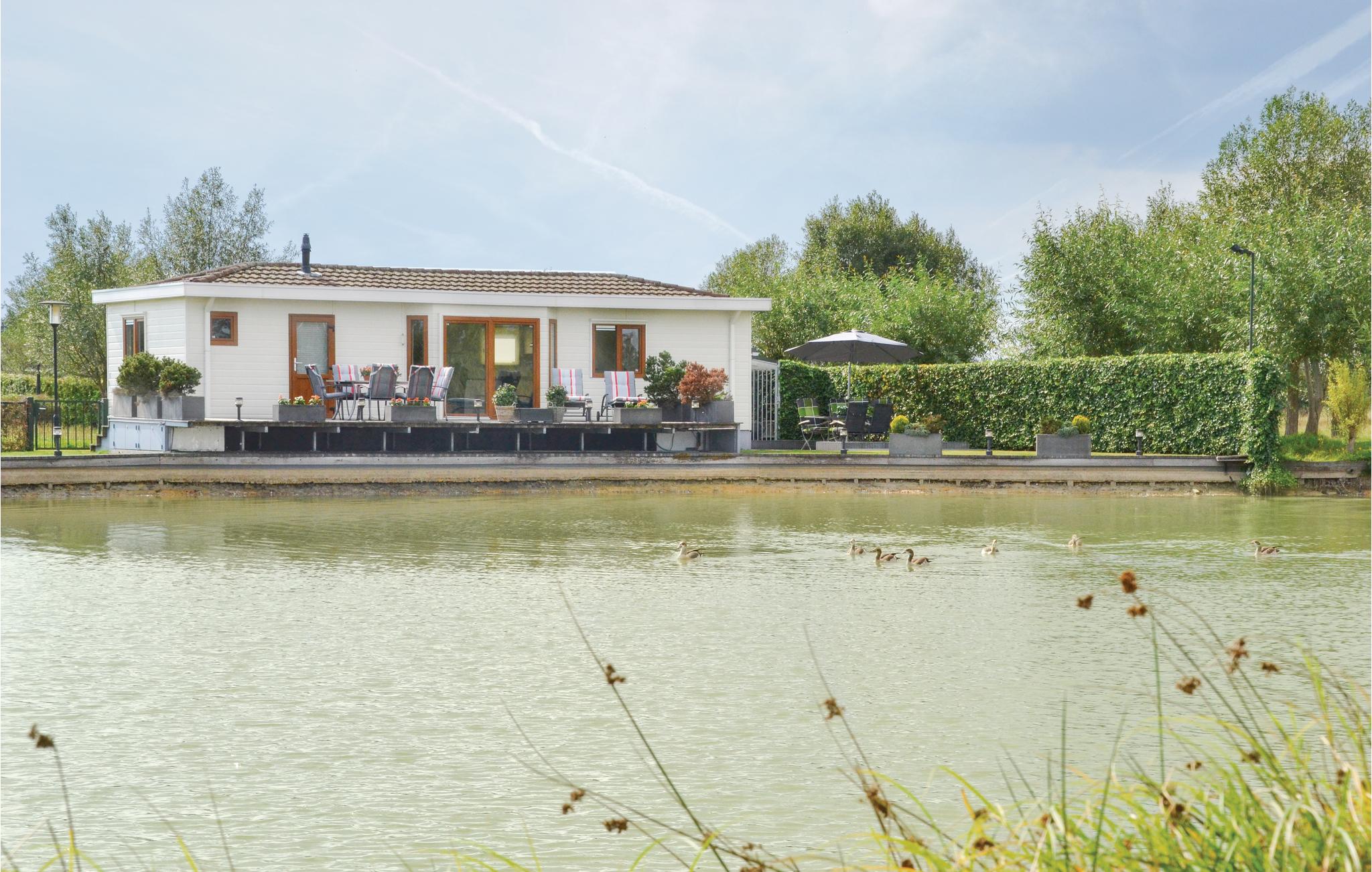 Awesome home in Molenschot with 2 Bedrooms and WiFi