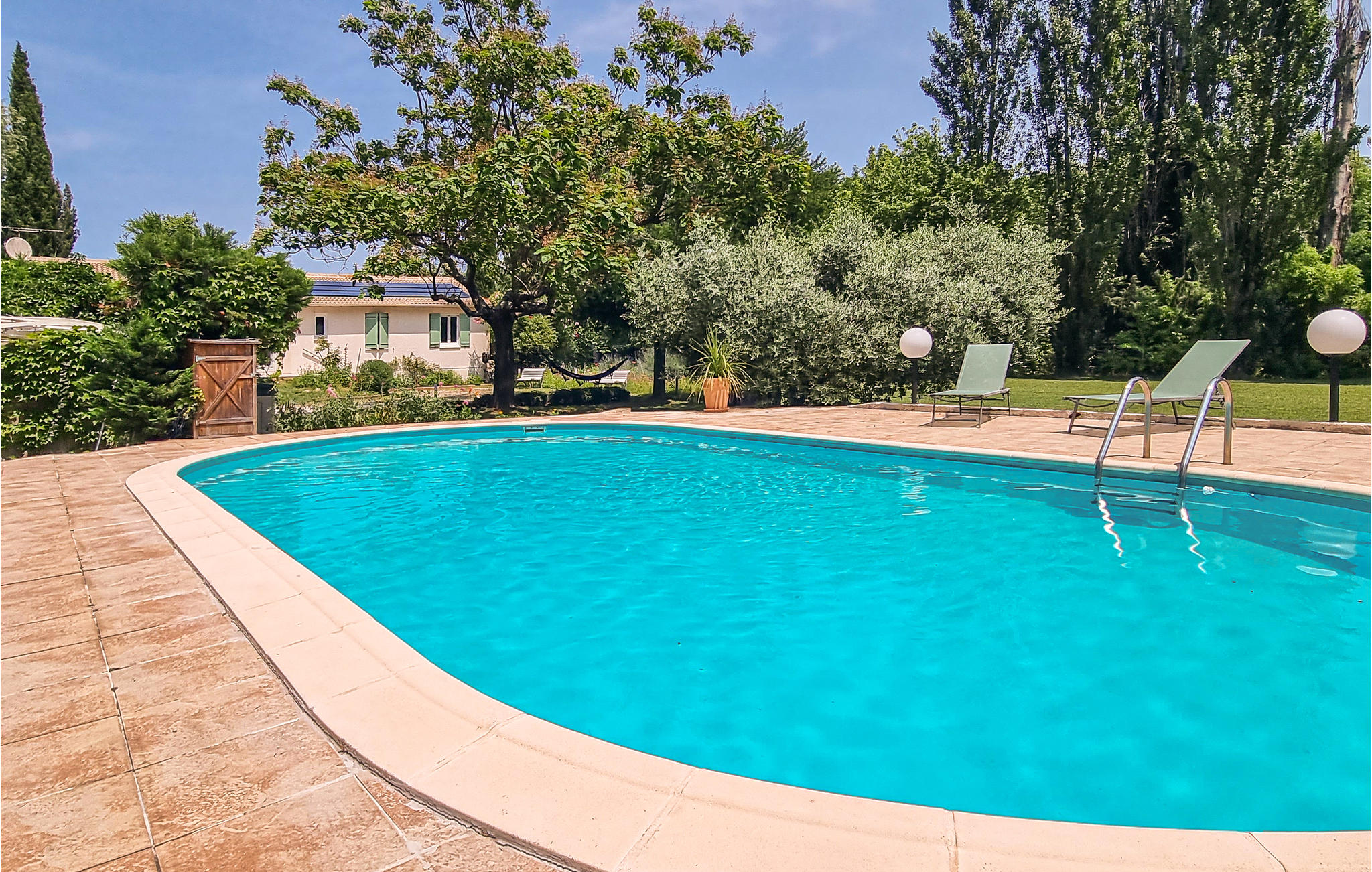 Nice home in Saint-Quentin-la-Poter with Outdoor swimming pool, WiFi and 4 Bedrooms
