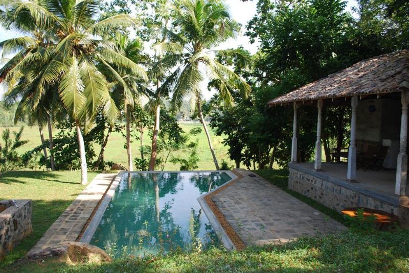 stone well garden villa