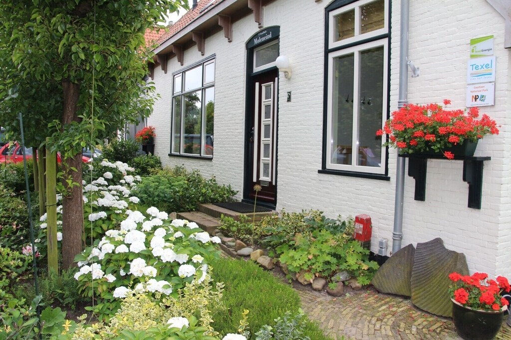 Stylish apartment with garden in a former farmhouse in De Waal