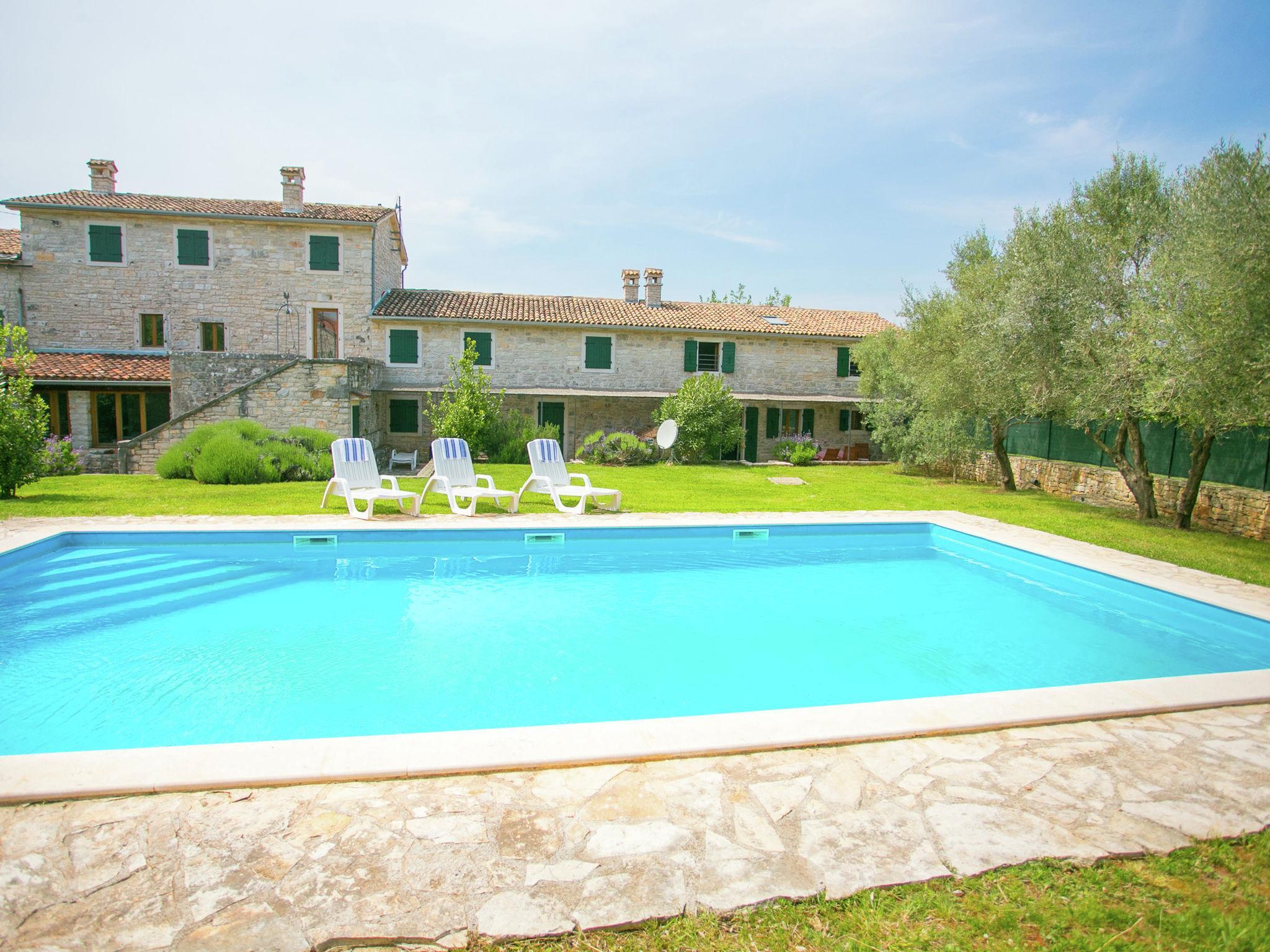 Beautiful holiday Apartment surrounded with a Stone wall with Pool and Garden